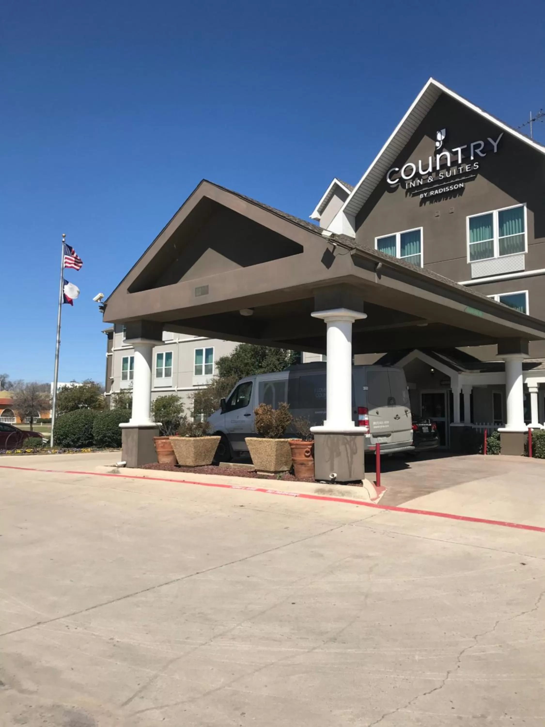 Property building in Country Inn & Suites by Radisson, Fort Worth, TX