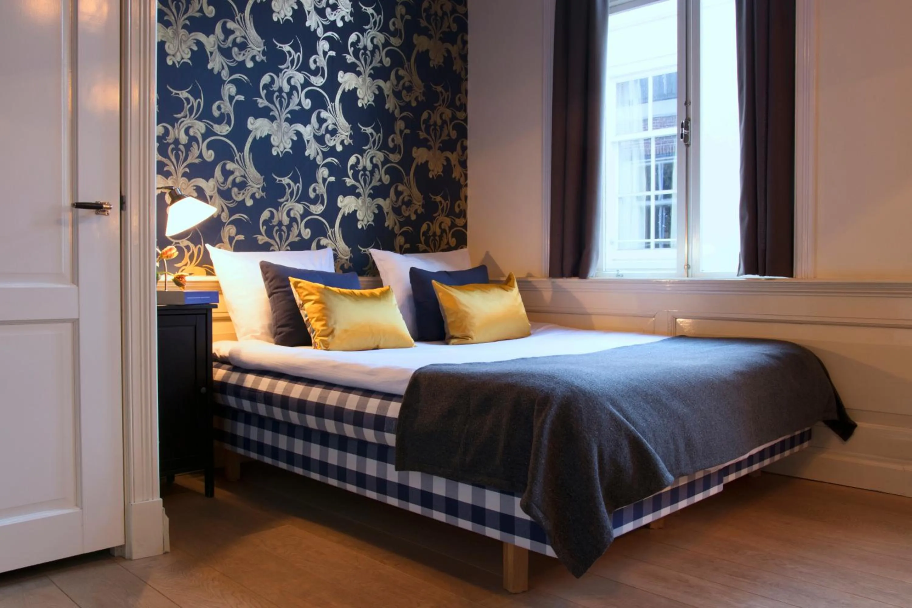 Bed in Grand Canal Boutique Hotel