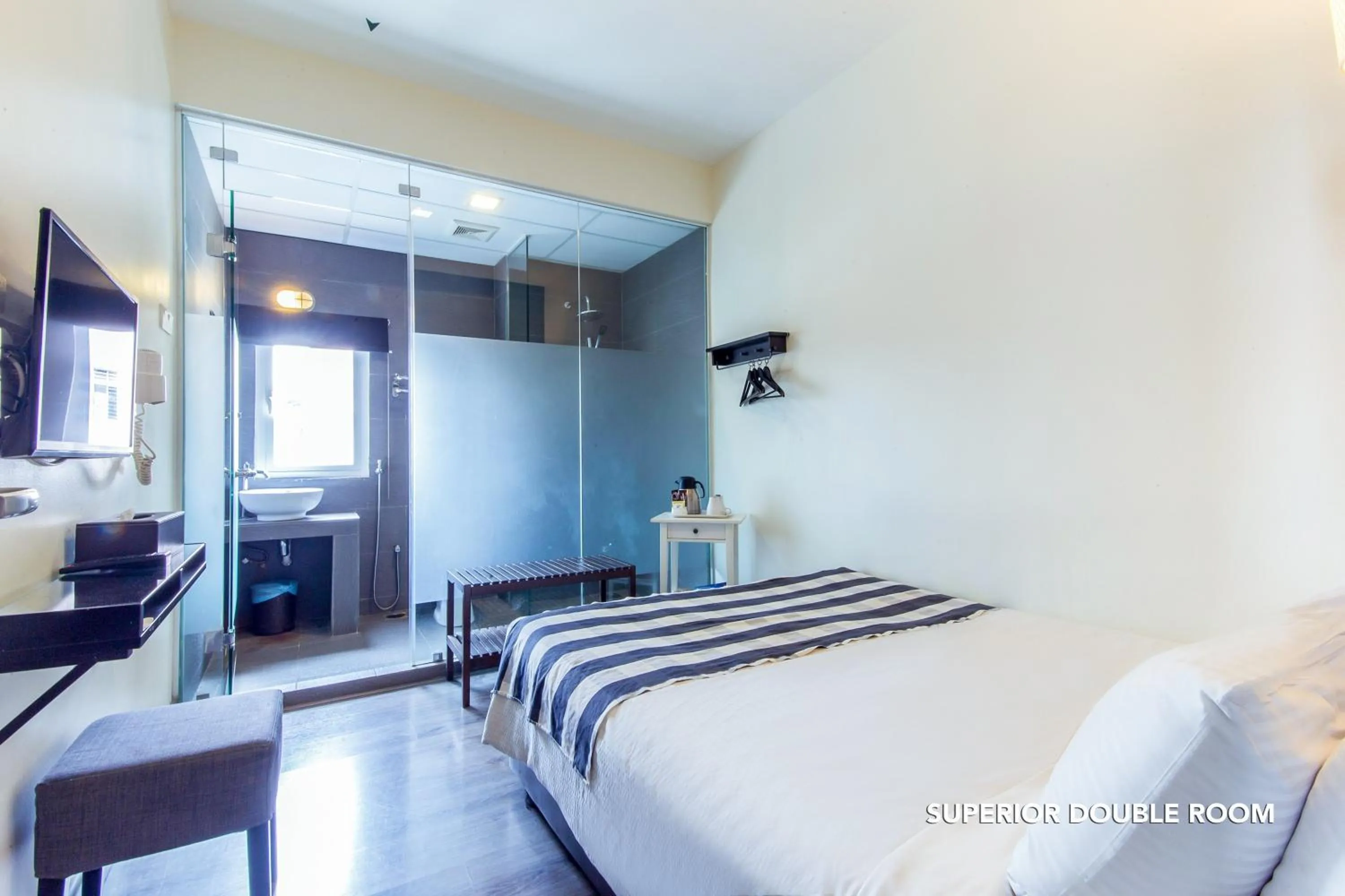 Bed in Ceria Hotel