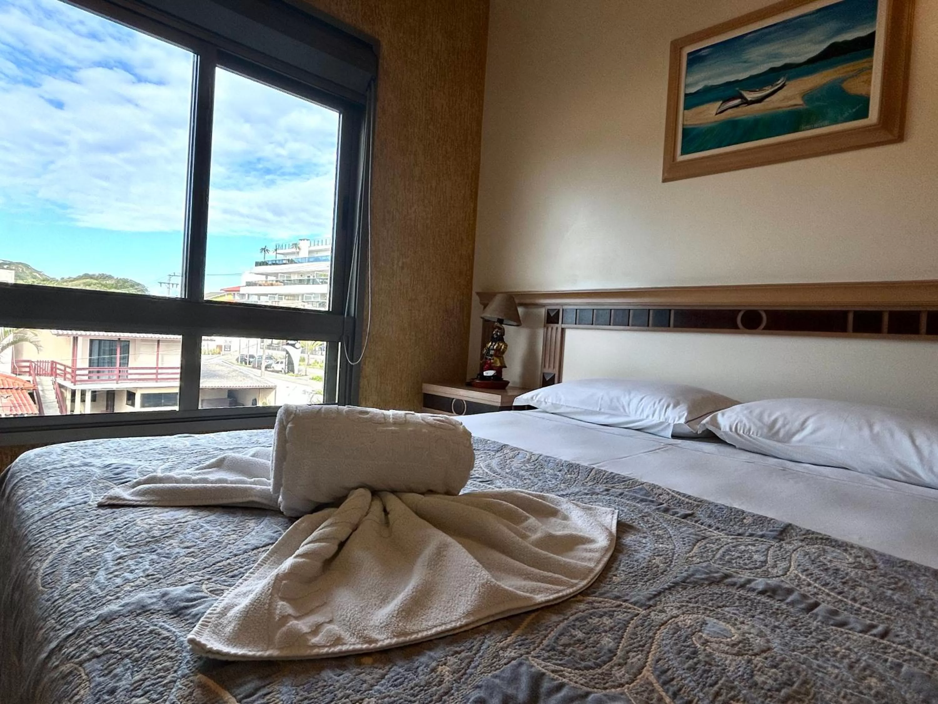 Bed in Golfinhos Apart Hotel