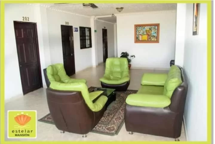 Communal lounge/ TV room in Hotel Mansión del Cesar