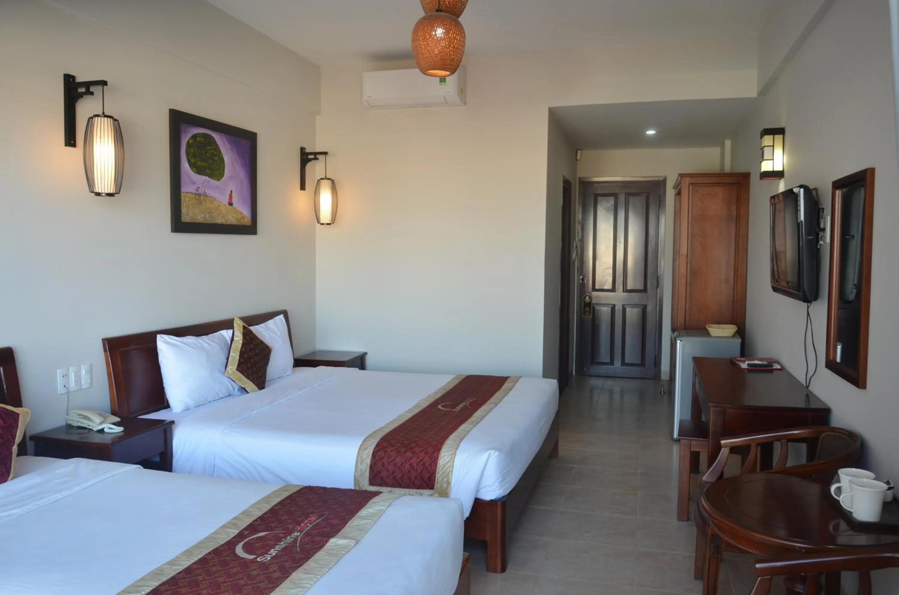 Bed in Sunshine Hoian Hotel