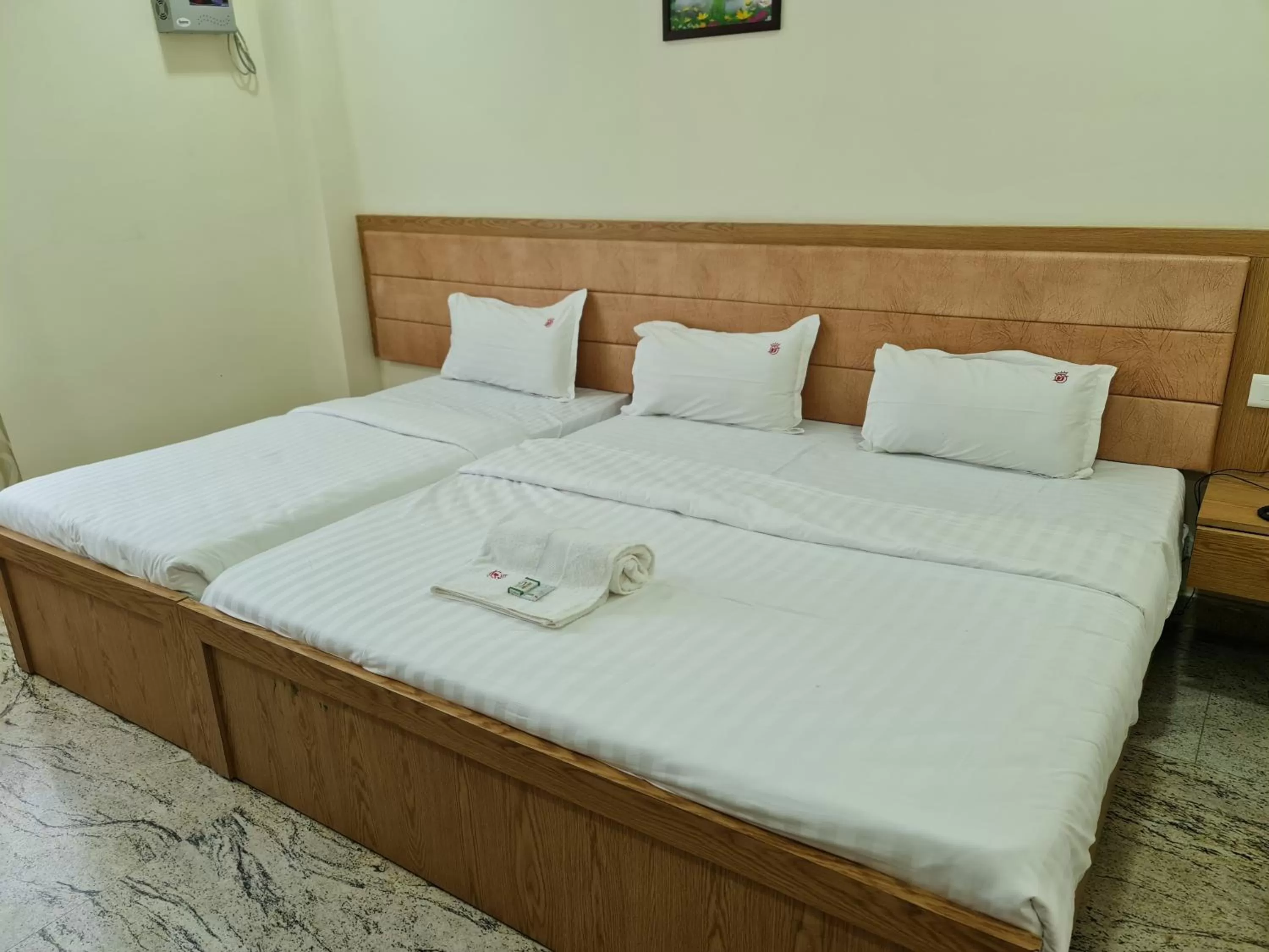 Bed in Vijay Shree Inn