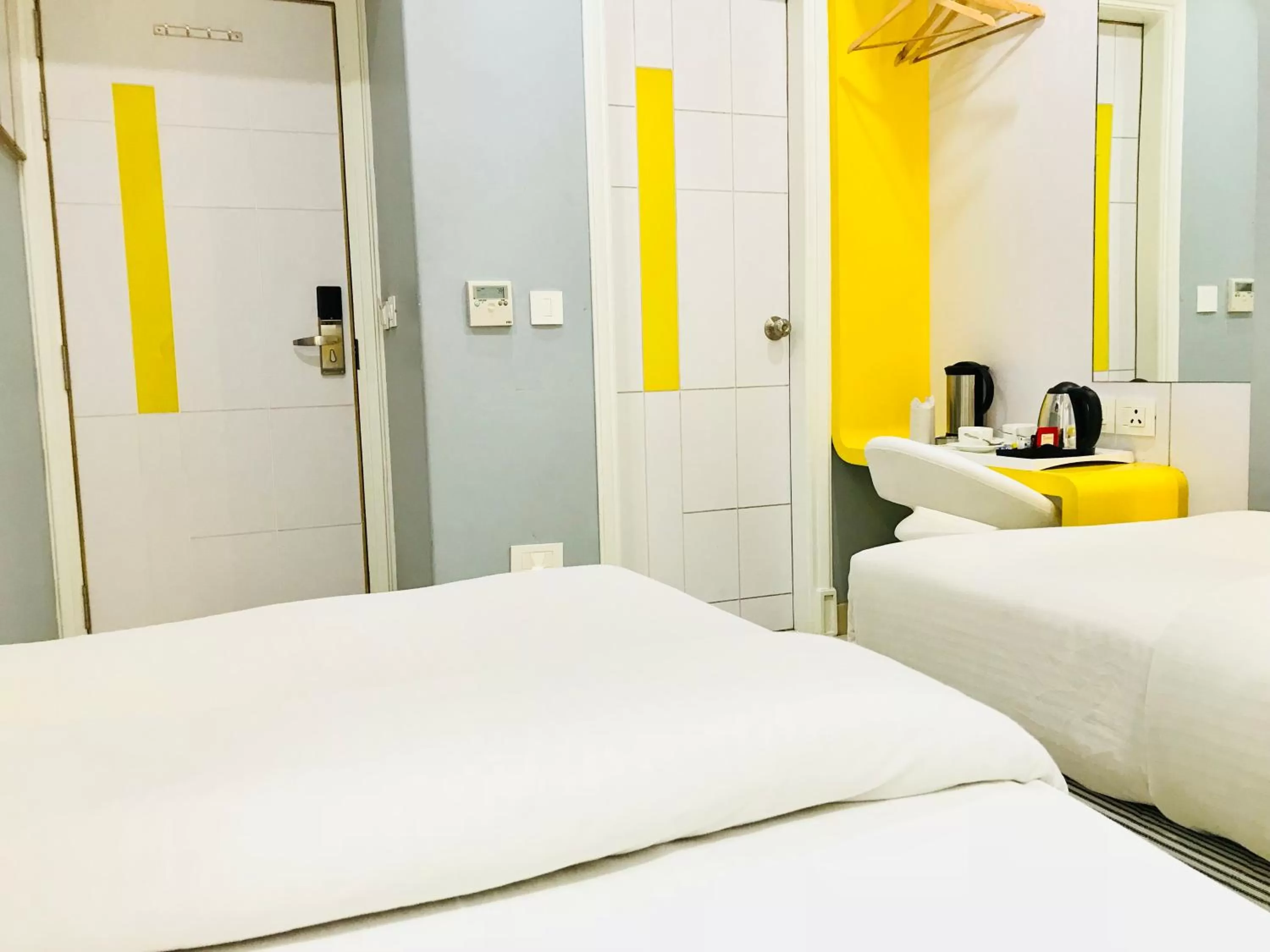 Photo of the whole room, Bed in City Empire - New Delhi Railway Station, Near Connaught Place