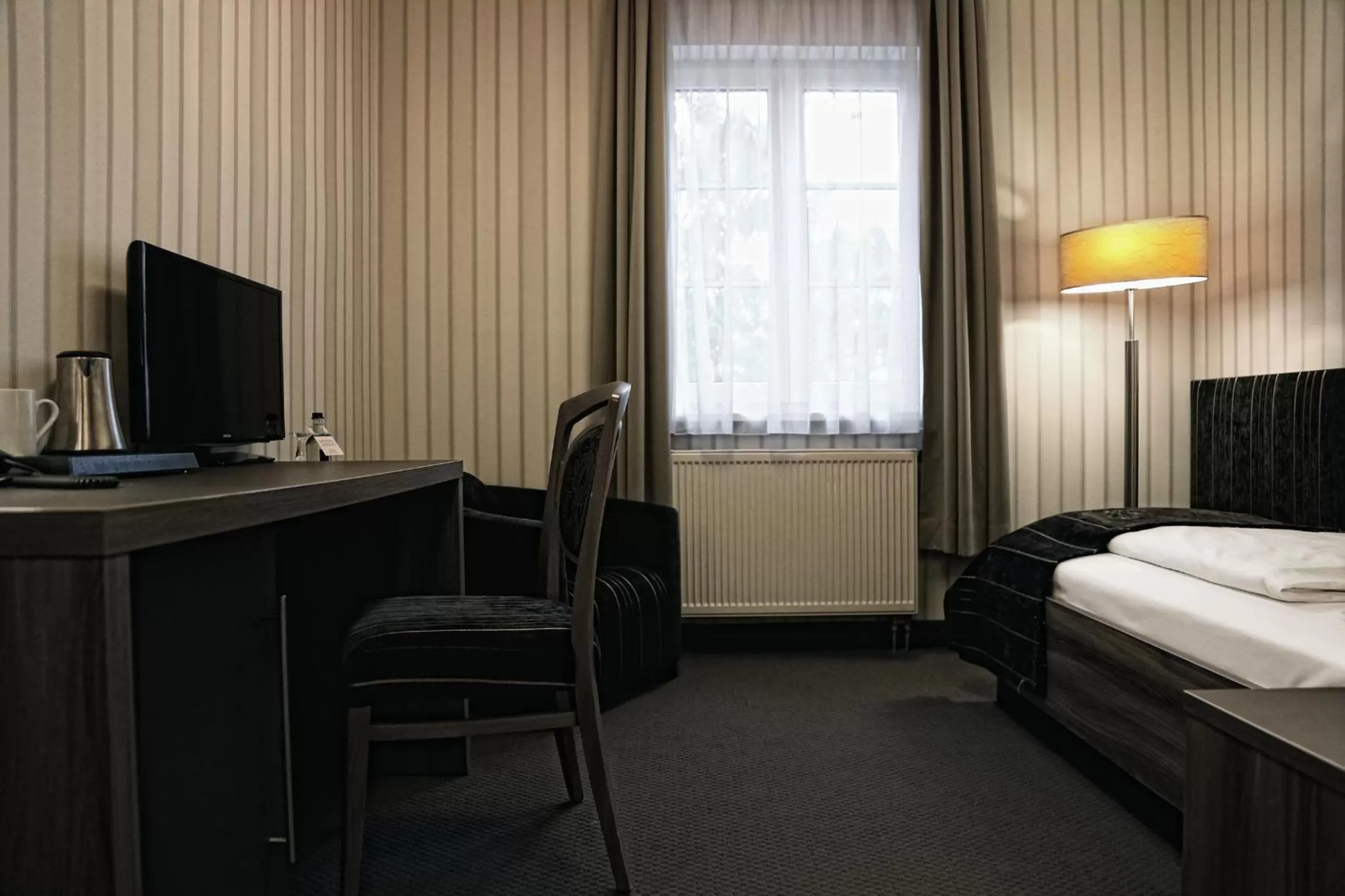 Photo of the whole room, Bed in Konsumhotel Dorotheenhof Weimar