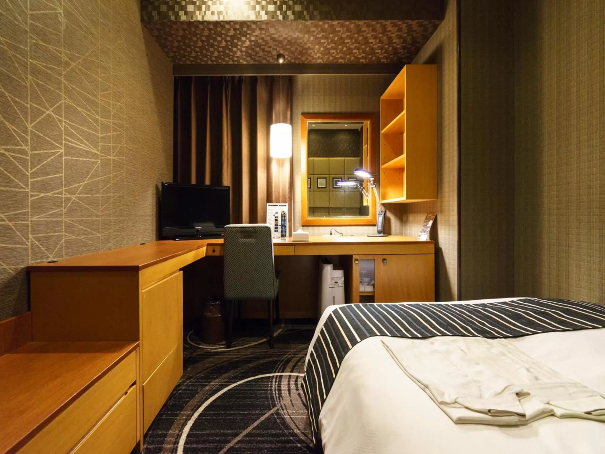 Bed in Sotetsu Fresa Inn Higashi Shinjuku