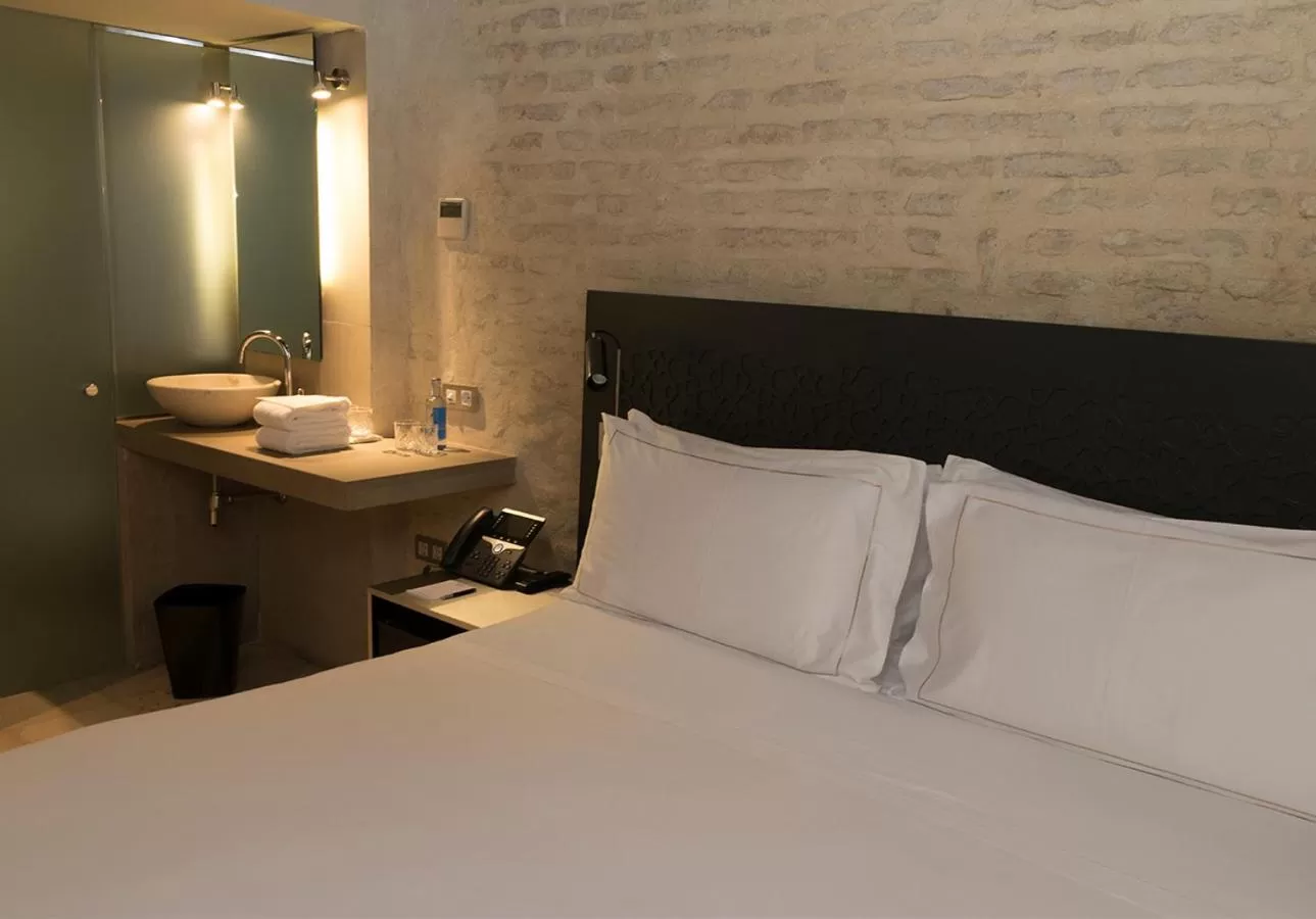 Bed in EME Catedral Mercer Hotel