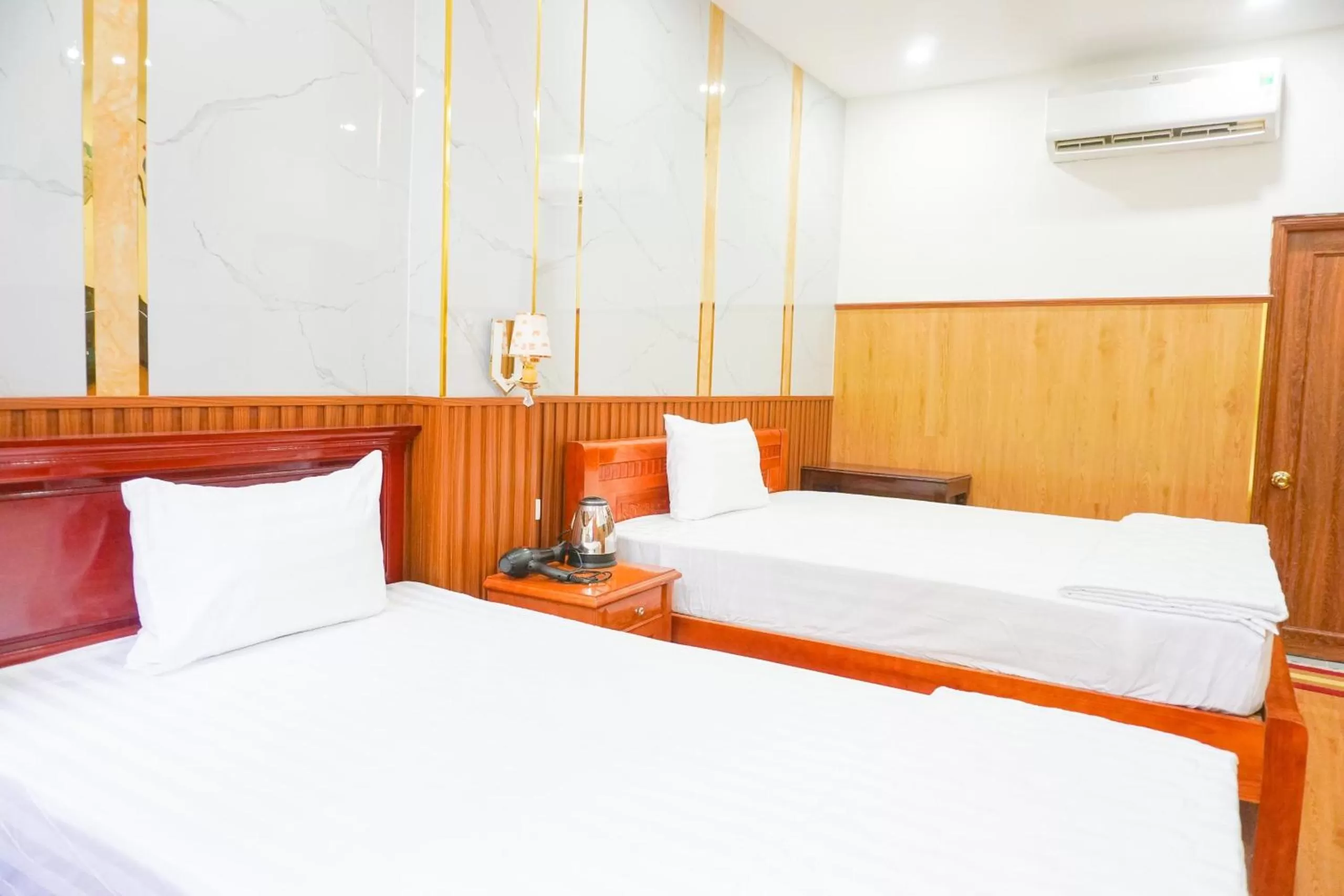 Bed in Nhu Y Hotel