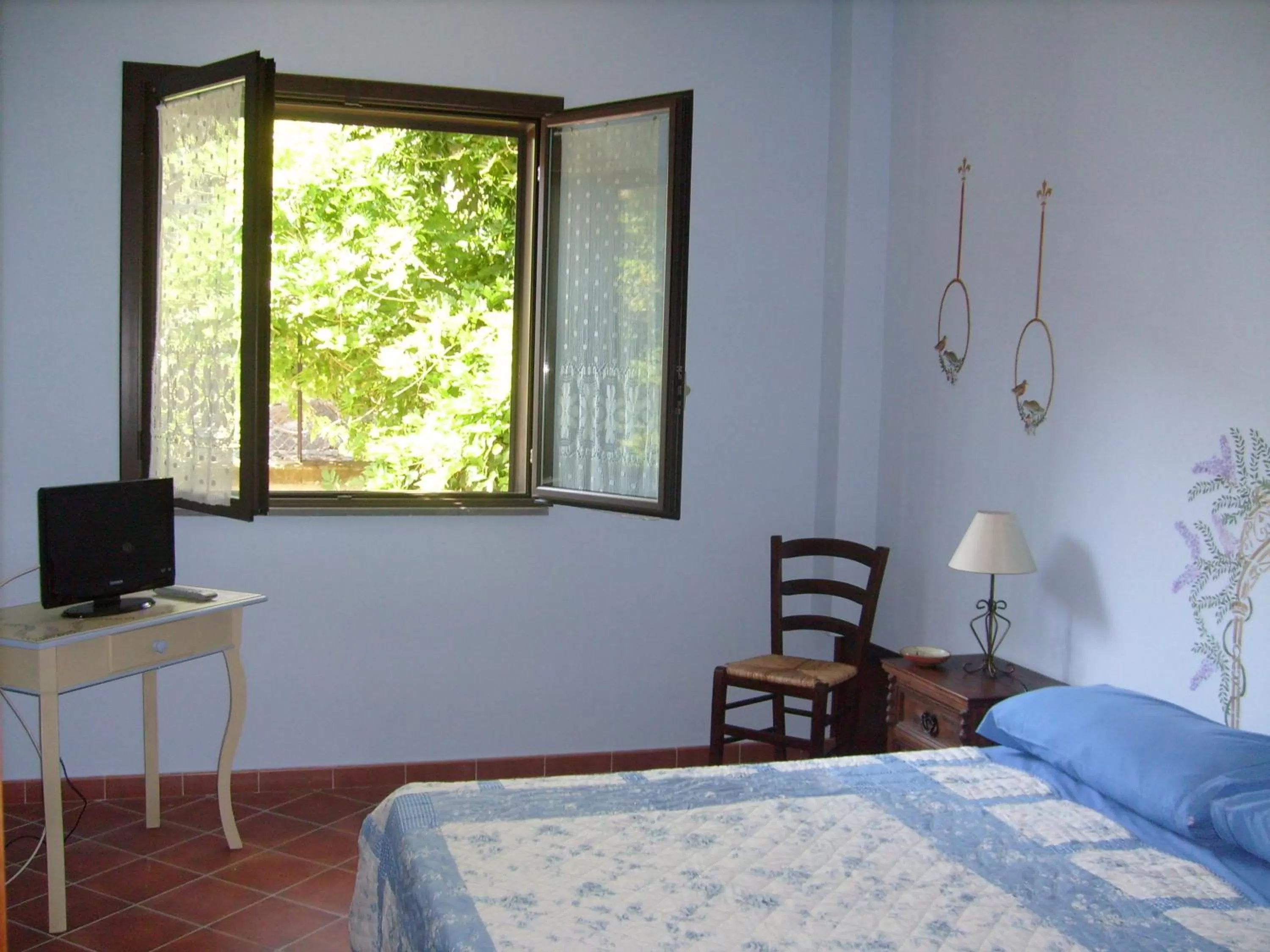 Bed in B&B La Rena Rossa