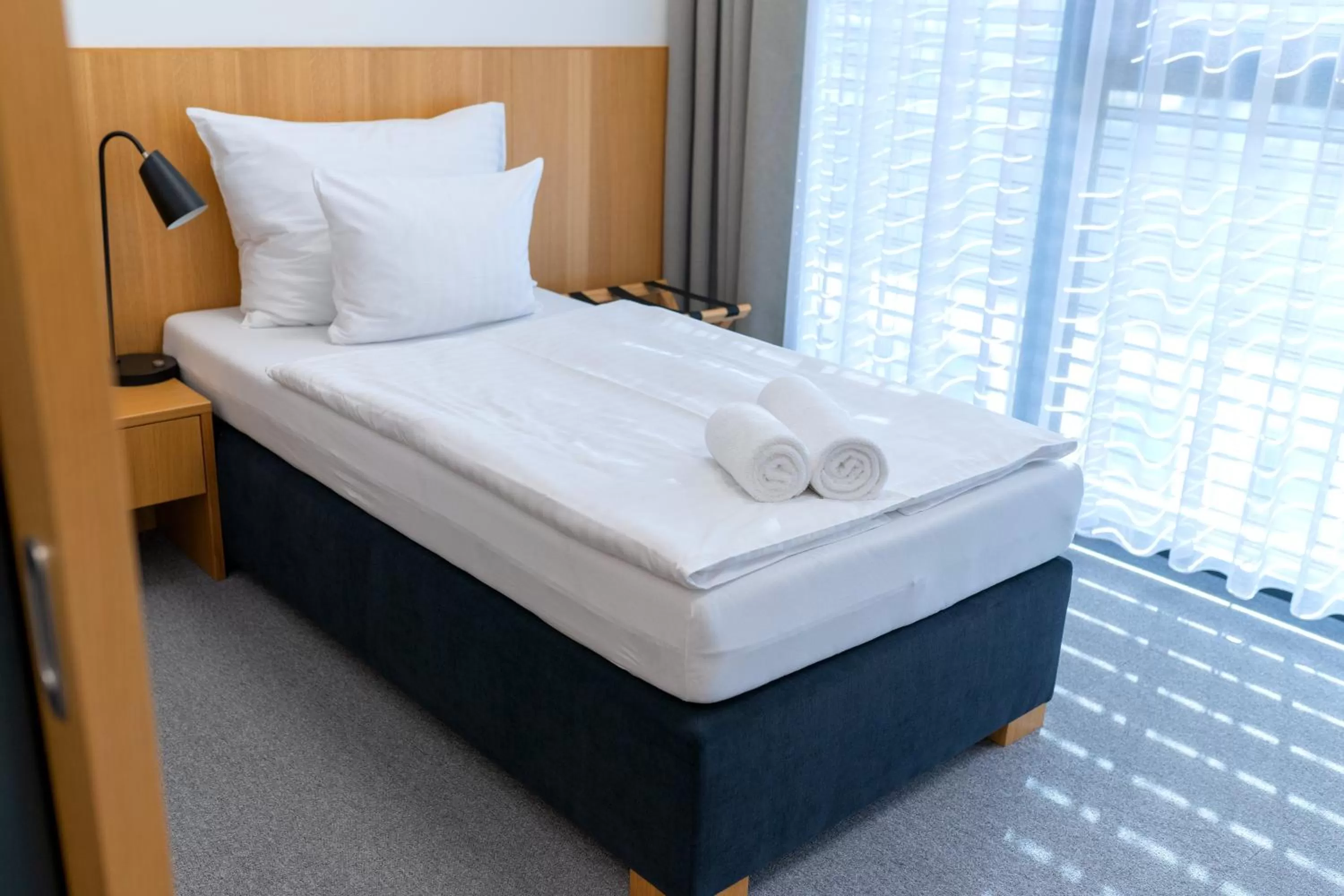 Bed in Hotel Smetanova