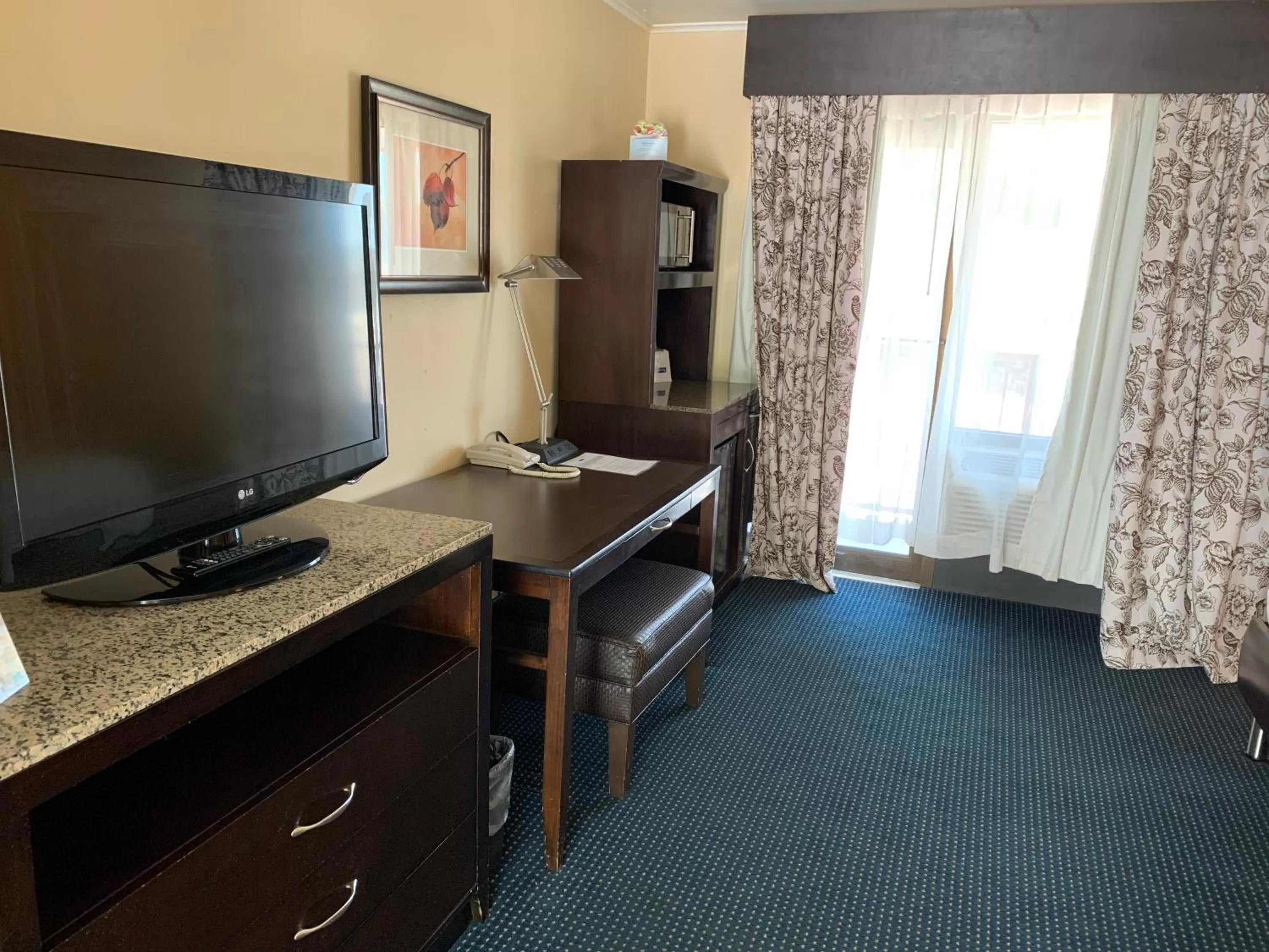 TV and multimedia in Travelodge by Wyndham Rapid City