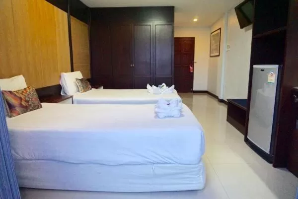 Photo of the whole room, Bed in Suppamitr Villa Hotel