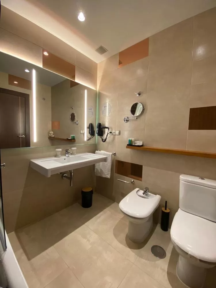 Bathroom in ON ALETA ROOM designed for adults