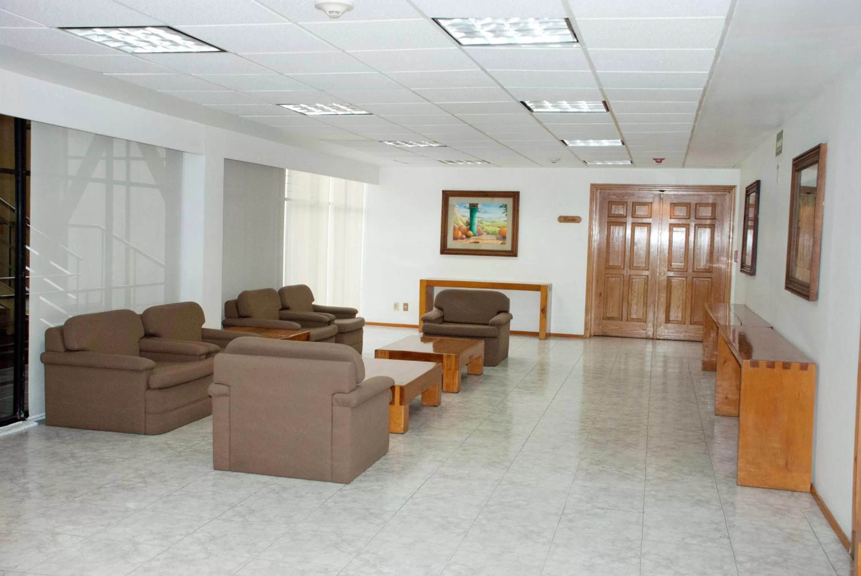 Lobby or reception in Hotel & Suites PF