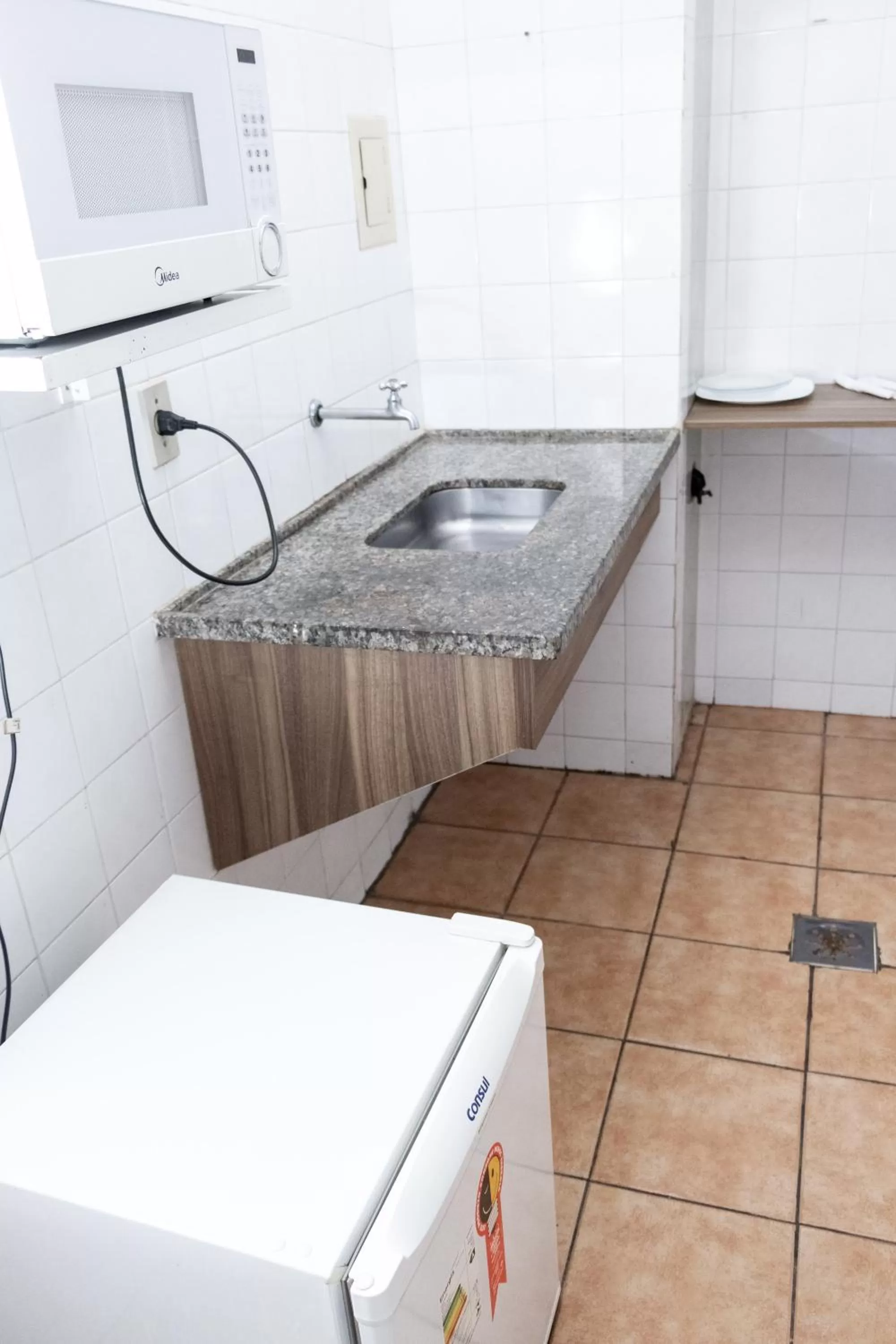 Kitchen or kitchenette in Hotel Alfa de Bauru Ltda