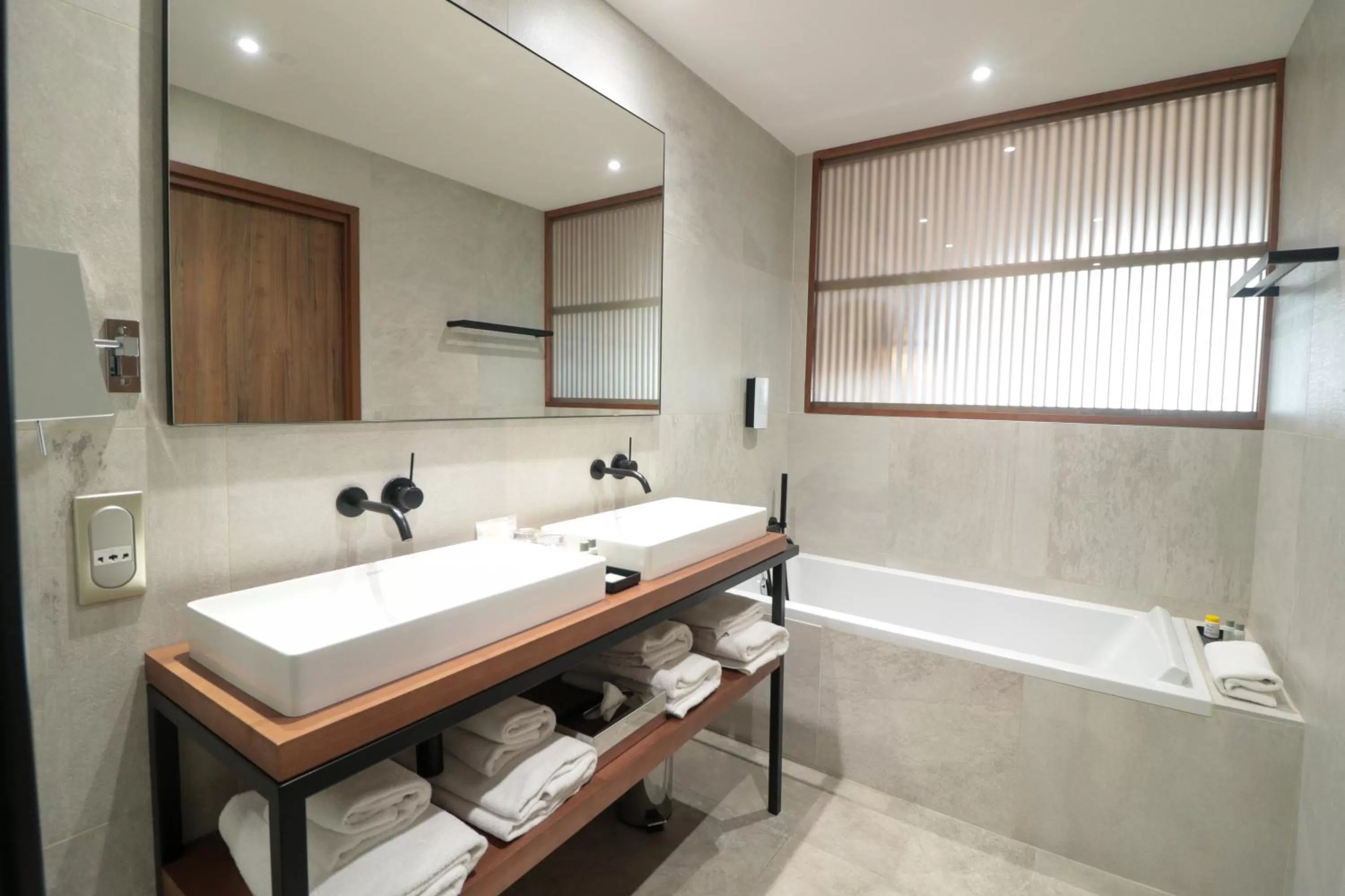 Bathroom in Golden Tulip Porto-Vecchio