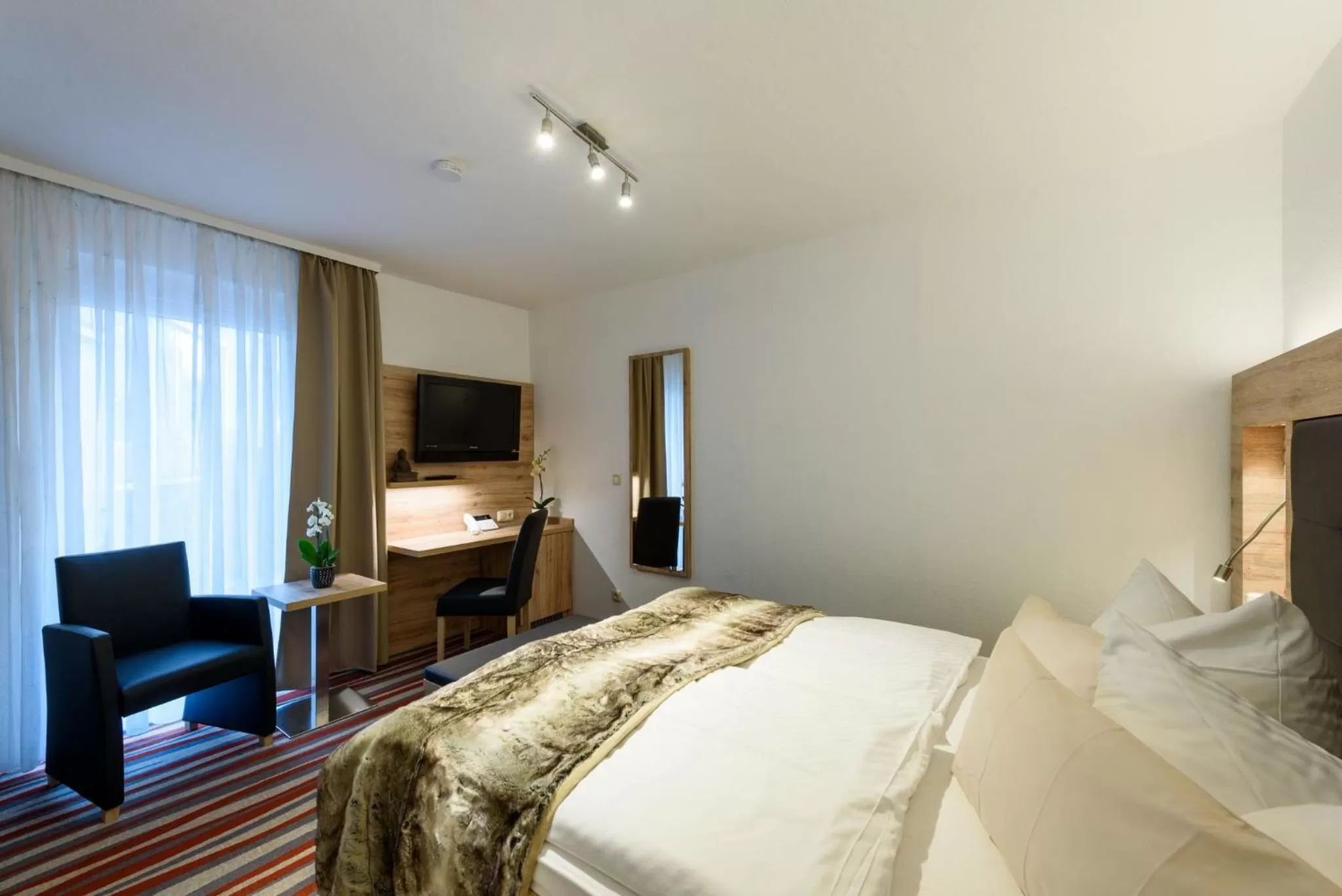 Photo of the whole room, Bed in Wellness & Ayurveda Hotel Am Eichenberg