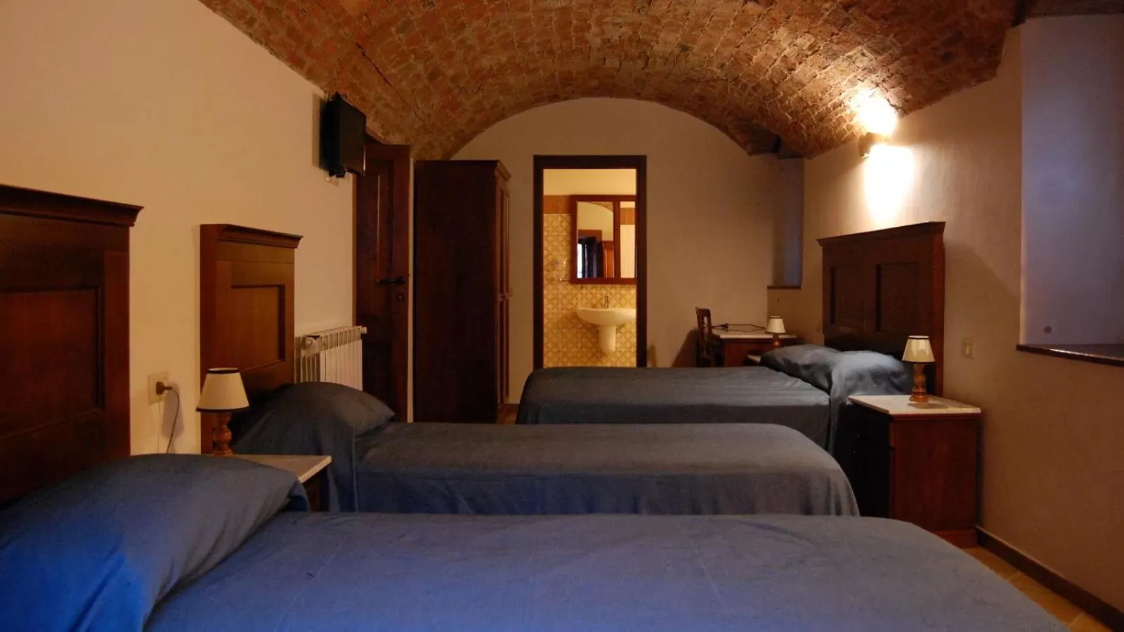 Bed in Albergo Miramonti