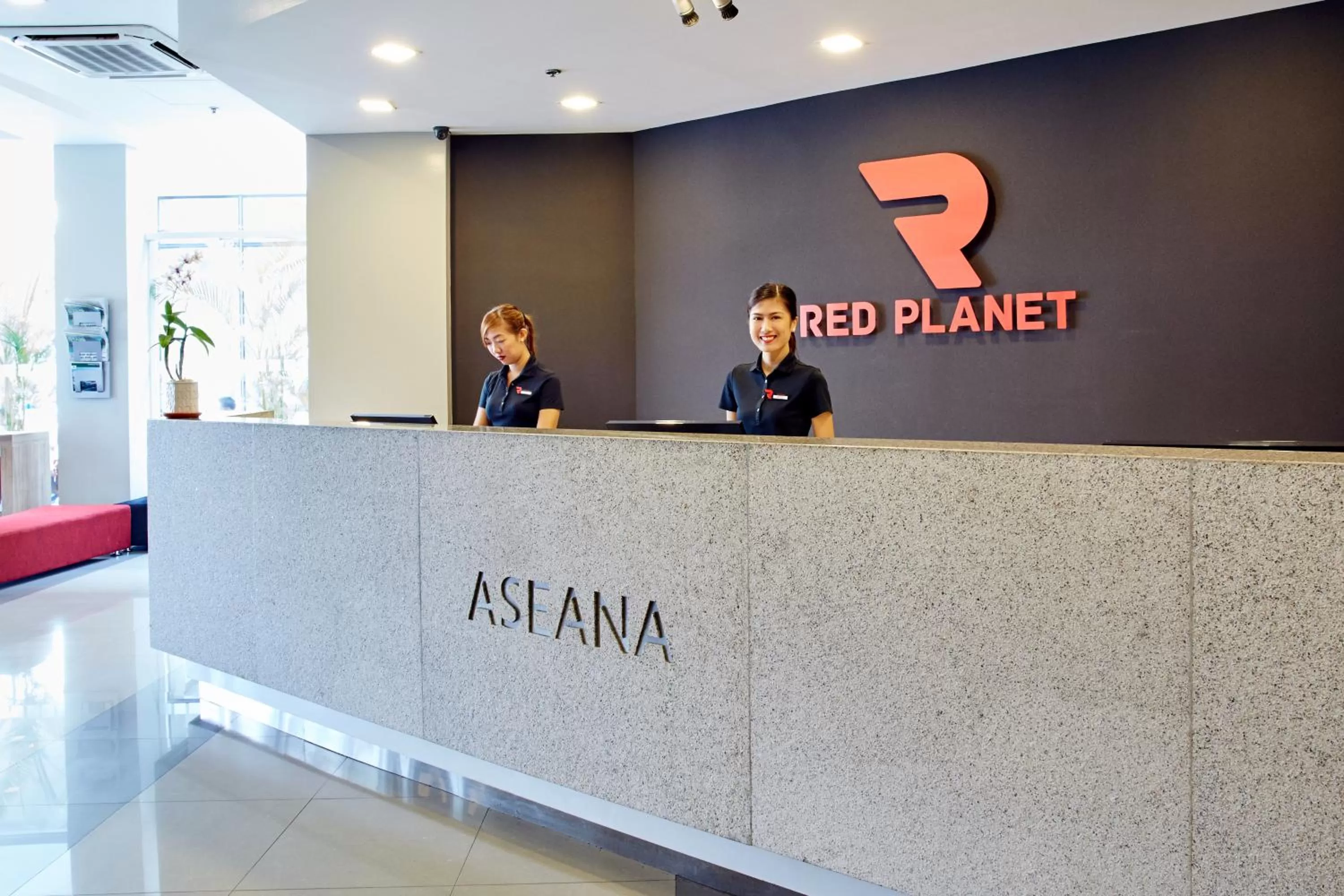 Staff in Red Planet Manila Aseana City