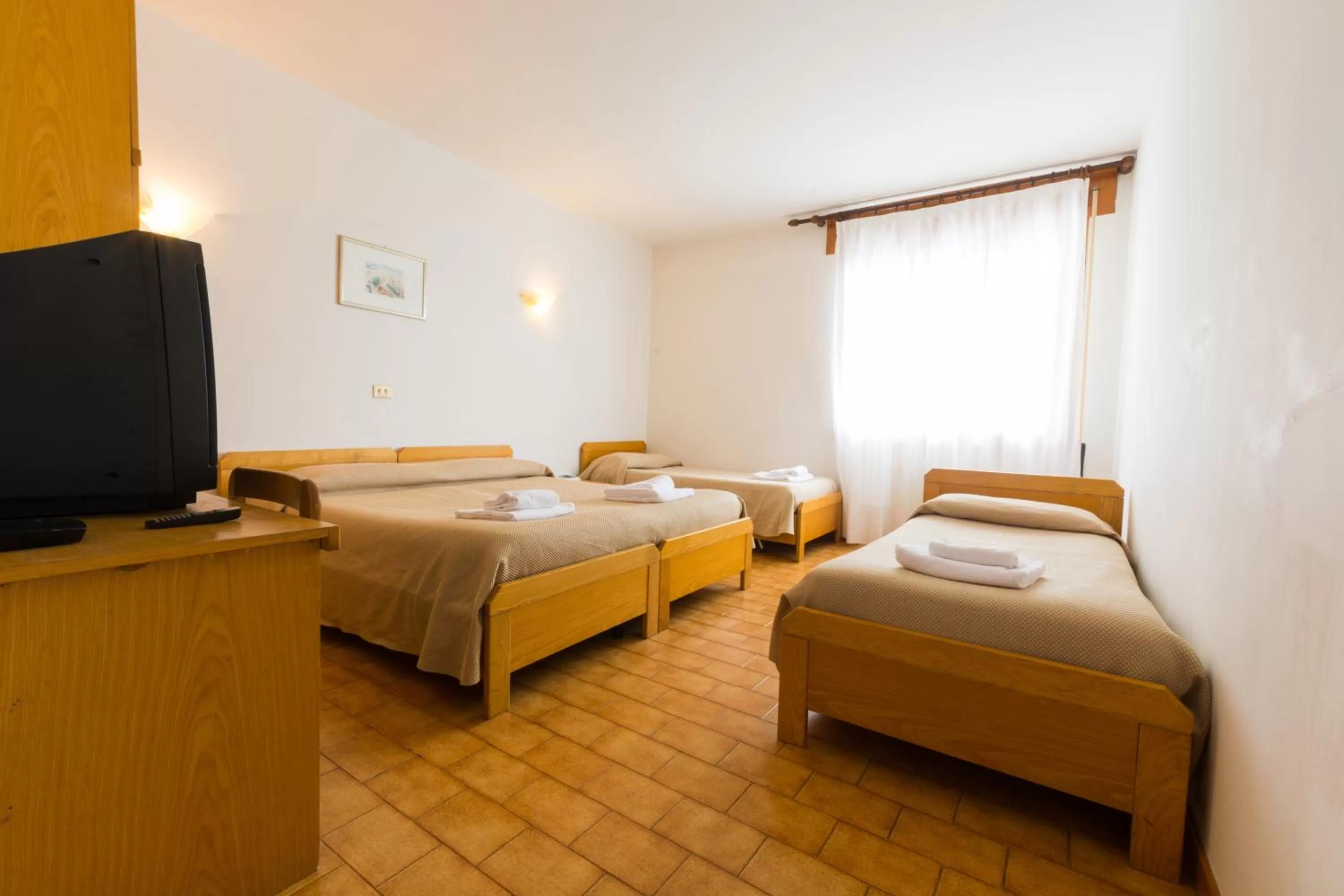 Bed in Albergo Dalla Mena
