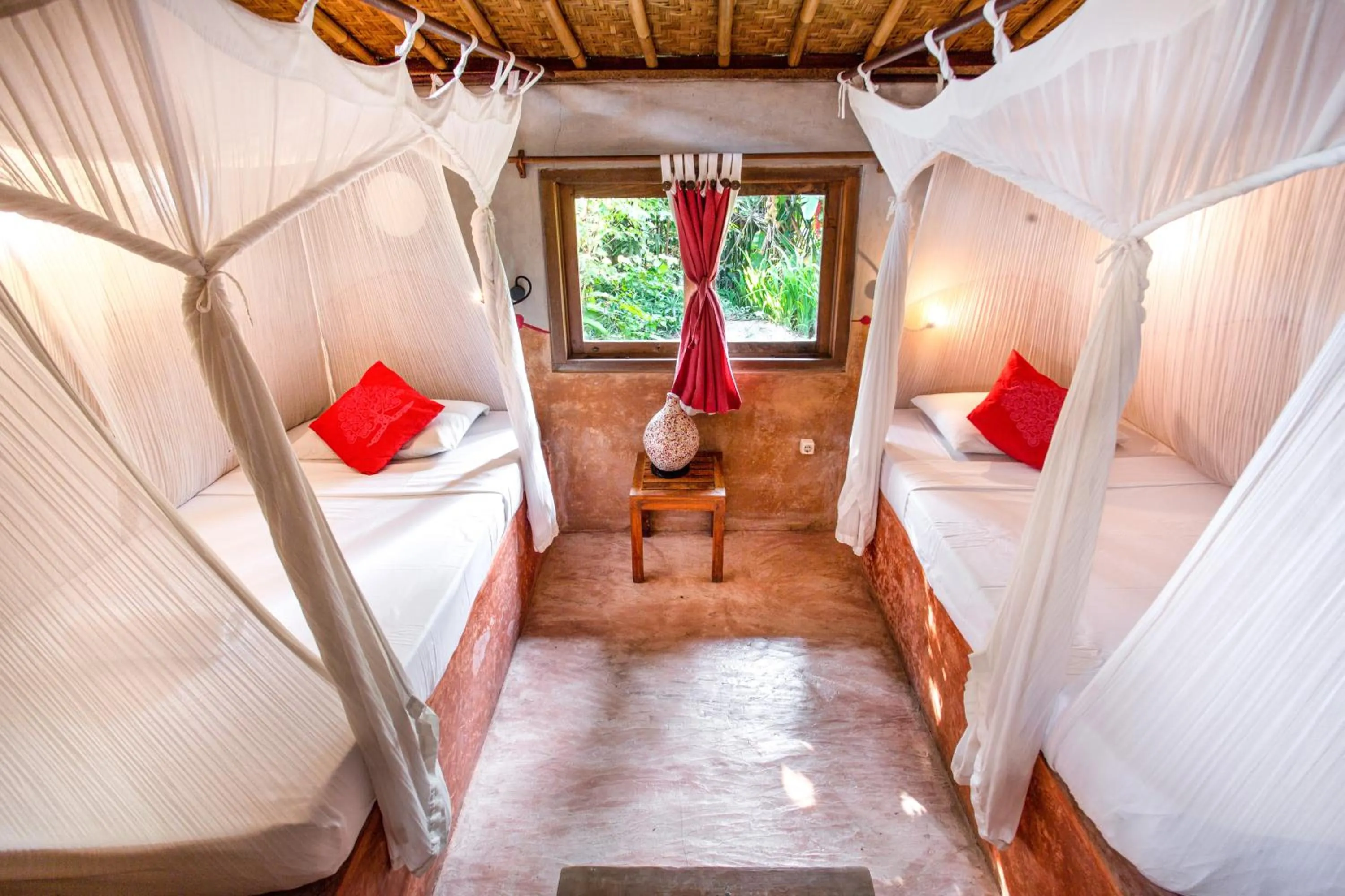 Bed in Swasti Eco Cottages