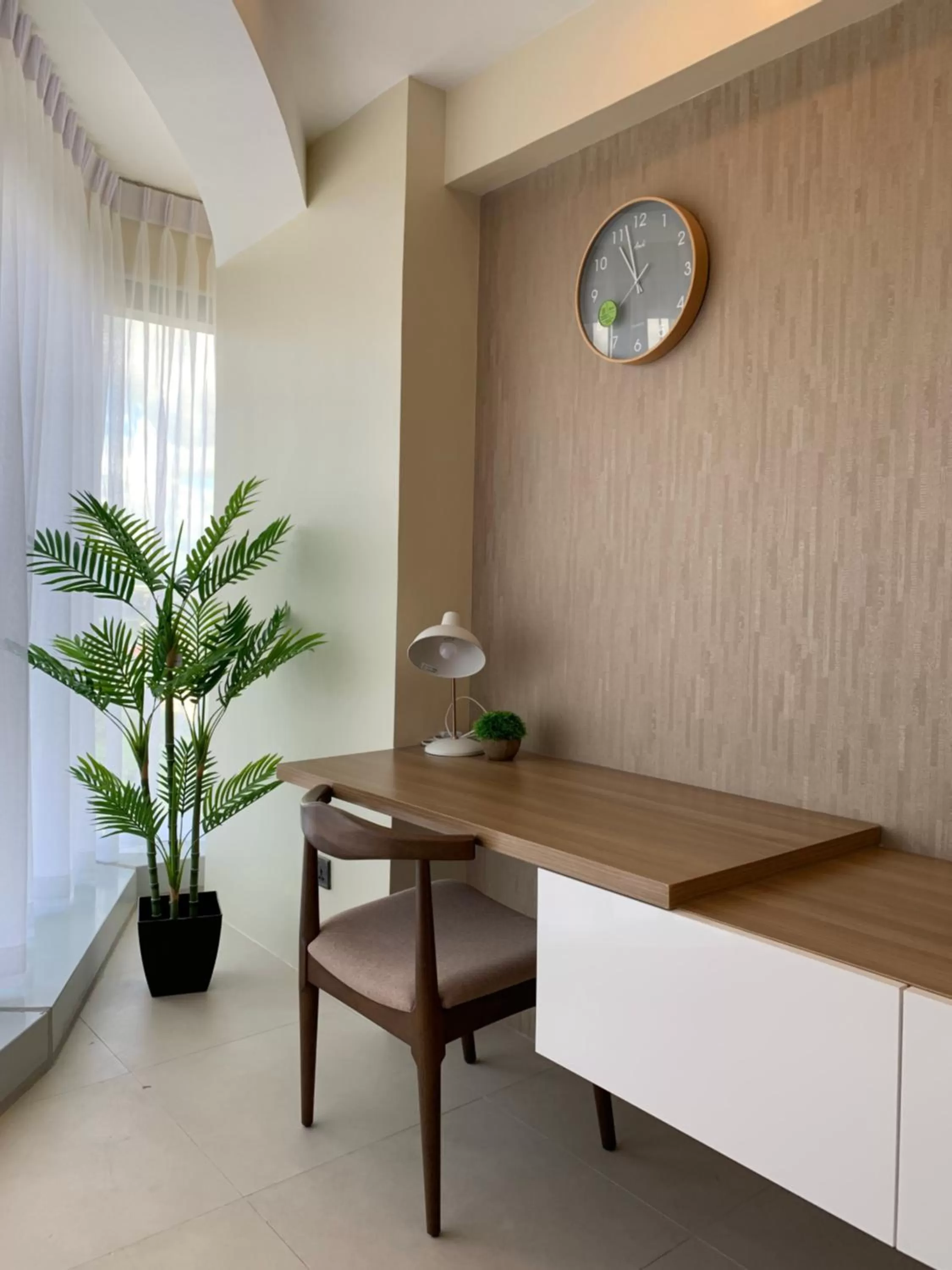 Seating area in AEON SUITES Staycation