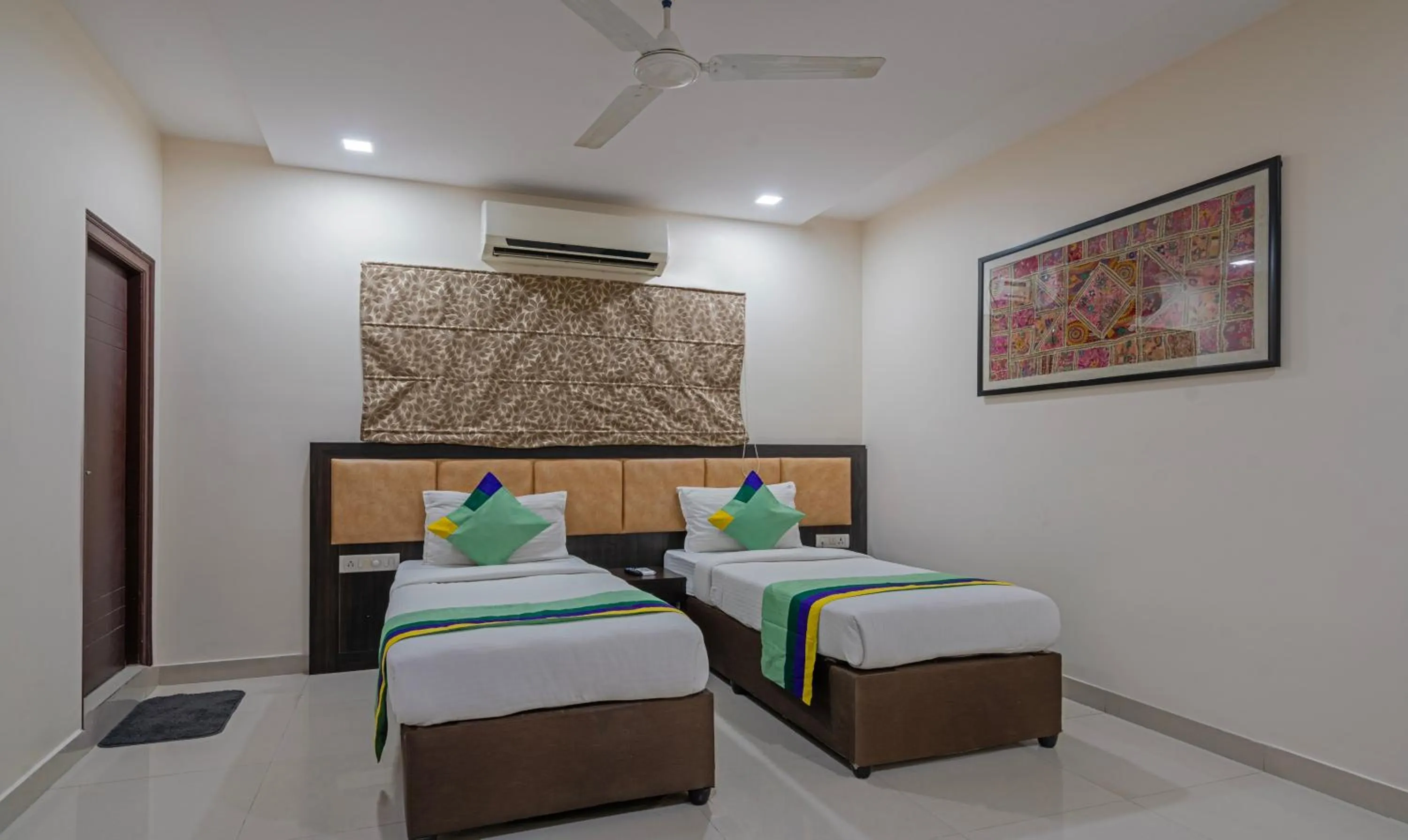 Bedroom, Bed in Treebo Emerald