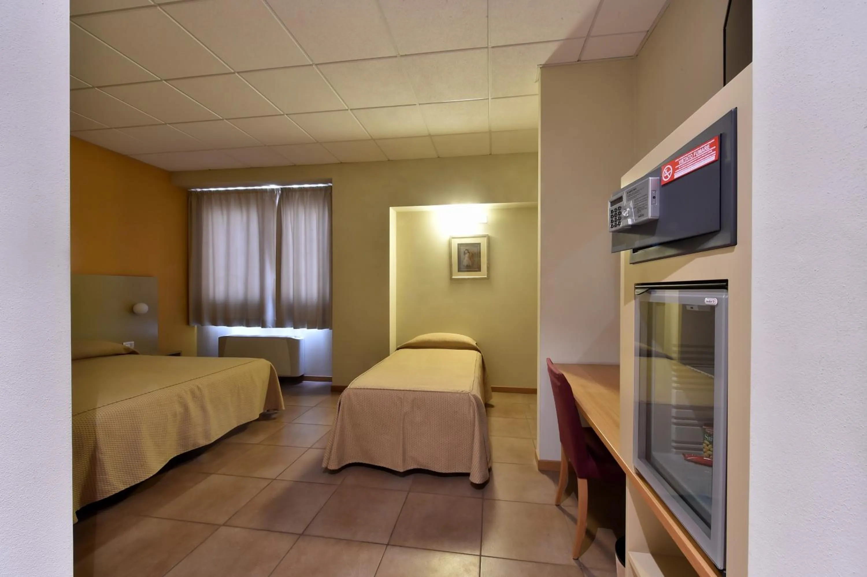 Triple Room in Tatì Hotel