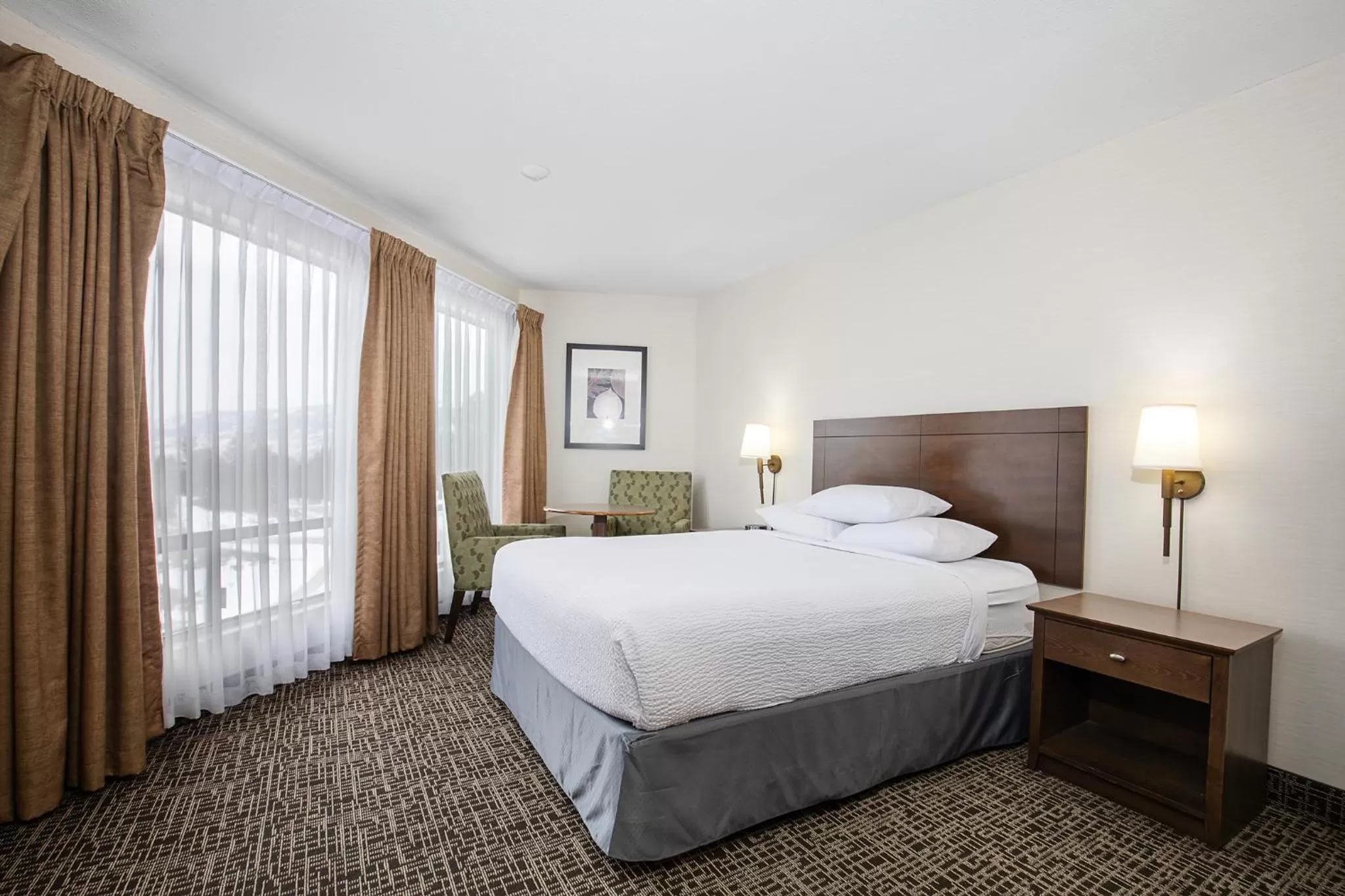 Bed in Ramada by Wyndham Kamloops