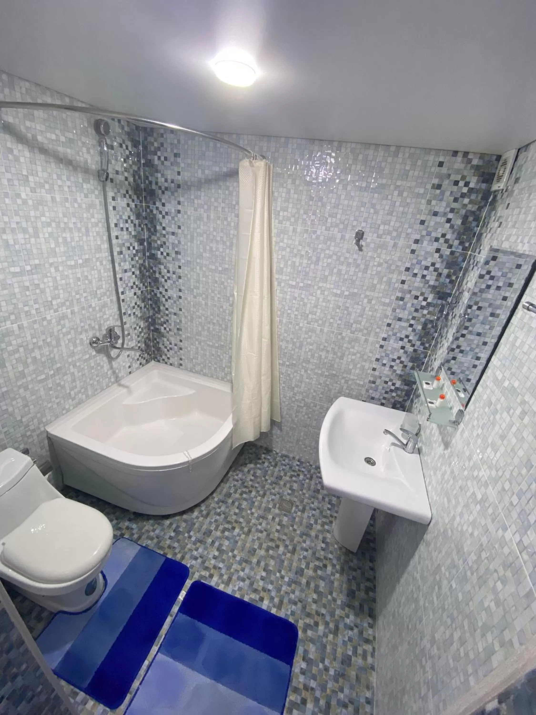 Shower in HOTEL UZBEGIM