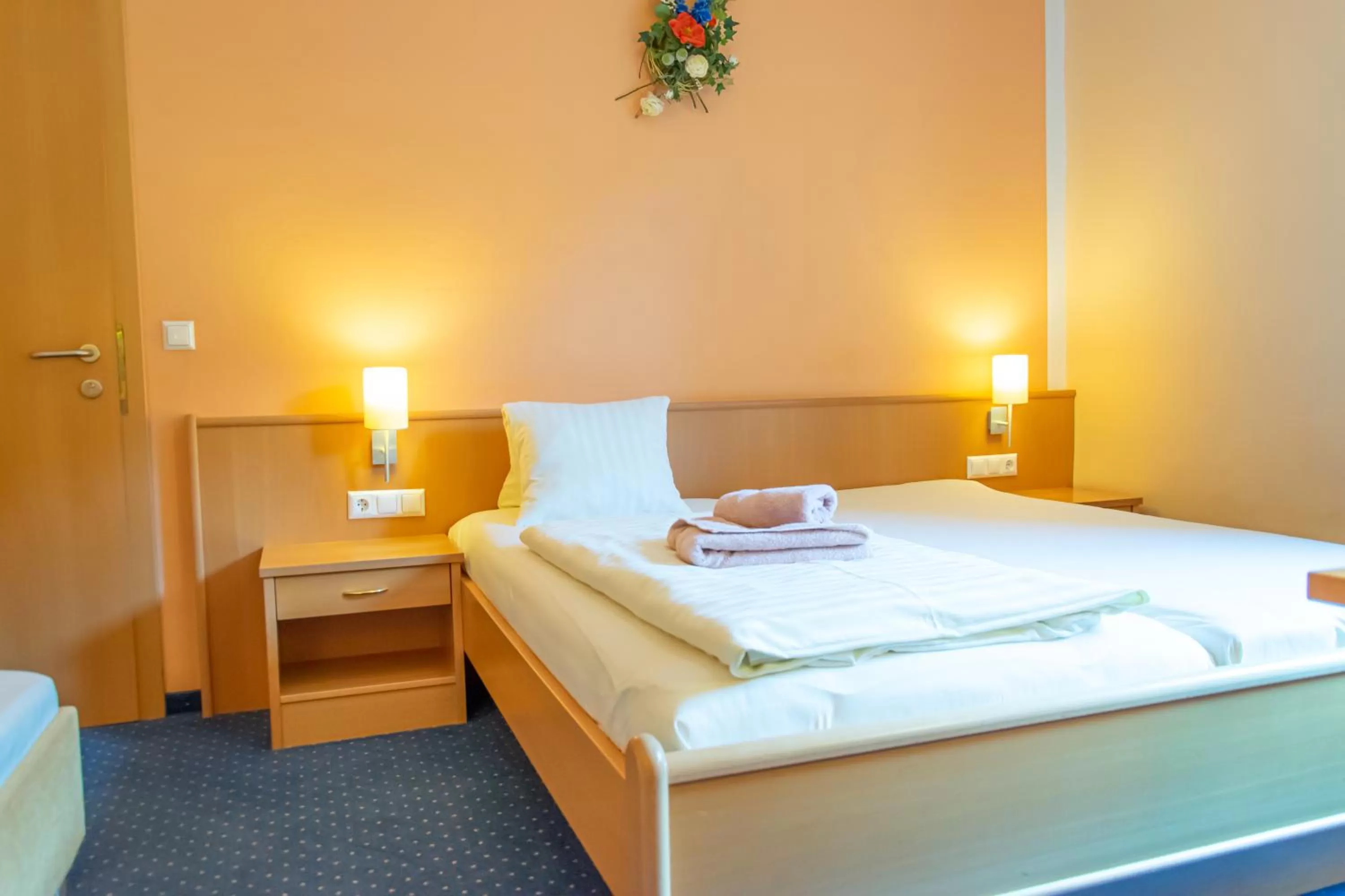 Bed in Strandhotel Burgstaller