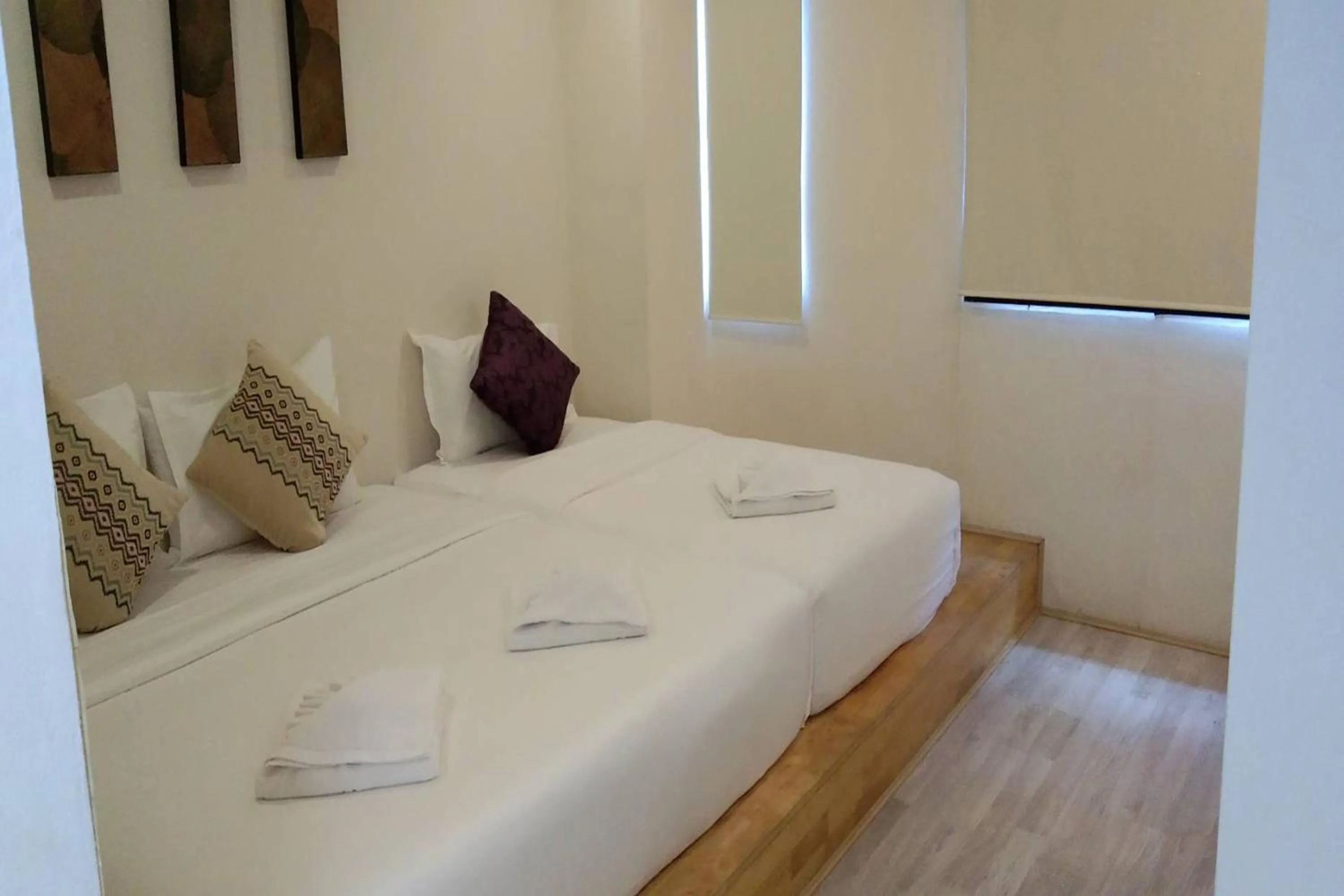 Bed in The Guest Arak Boutique Hotel