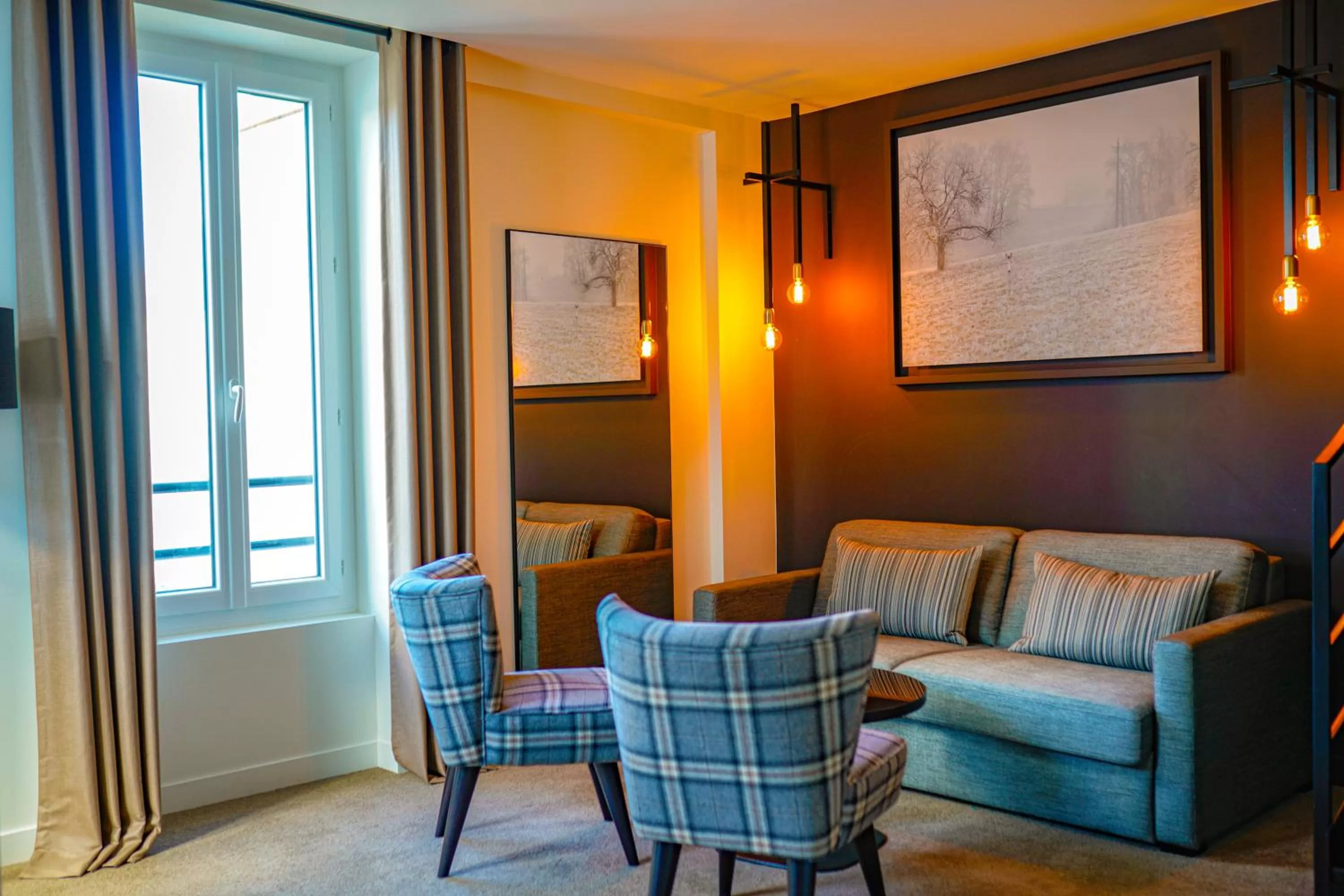 Seating area in Hôtel-Restaurant Bel Ami