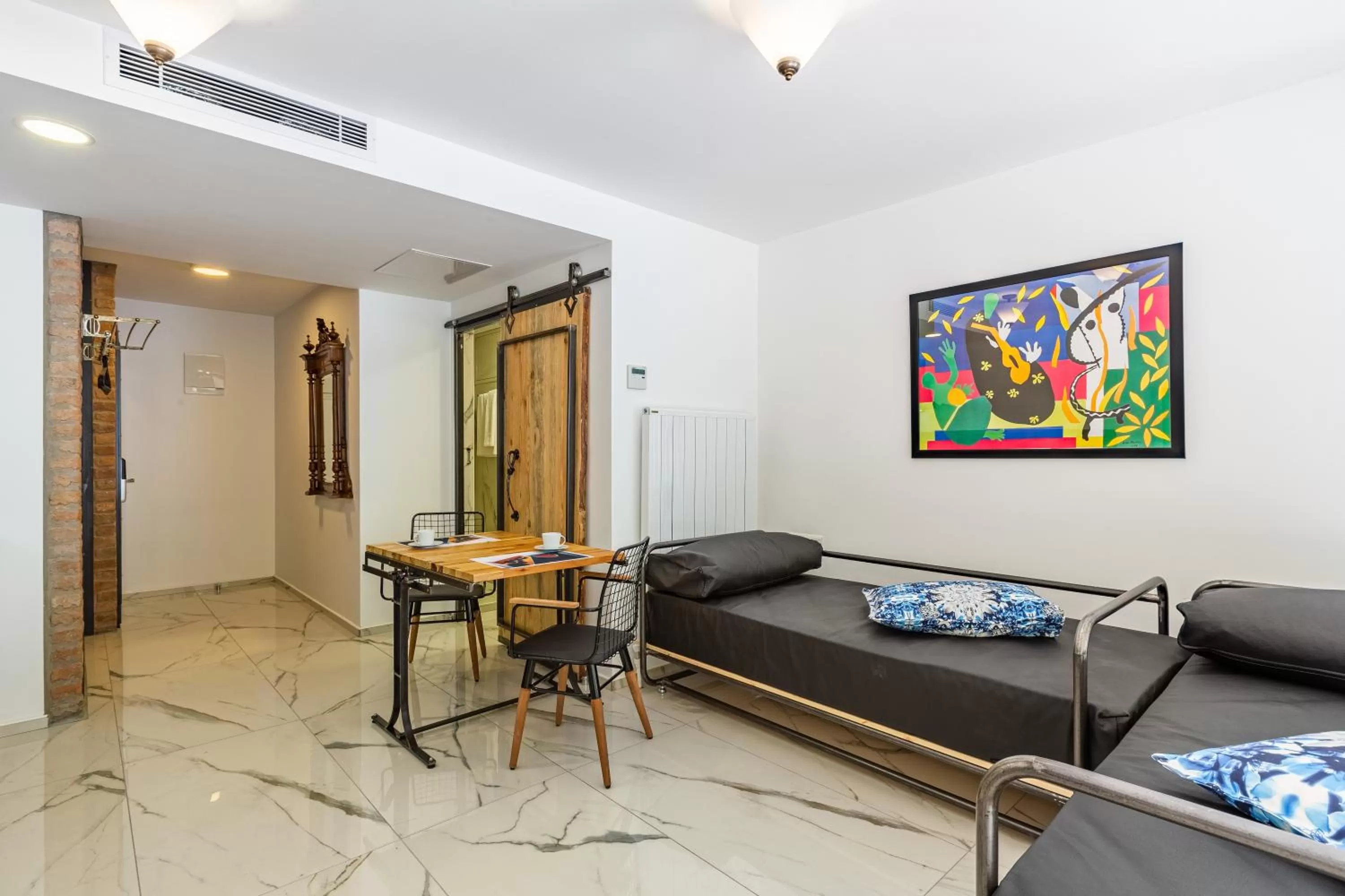 Bed in Villa Pera Suite Hotel