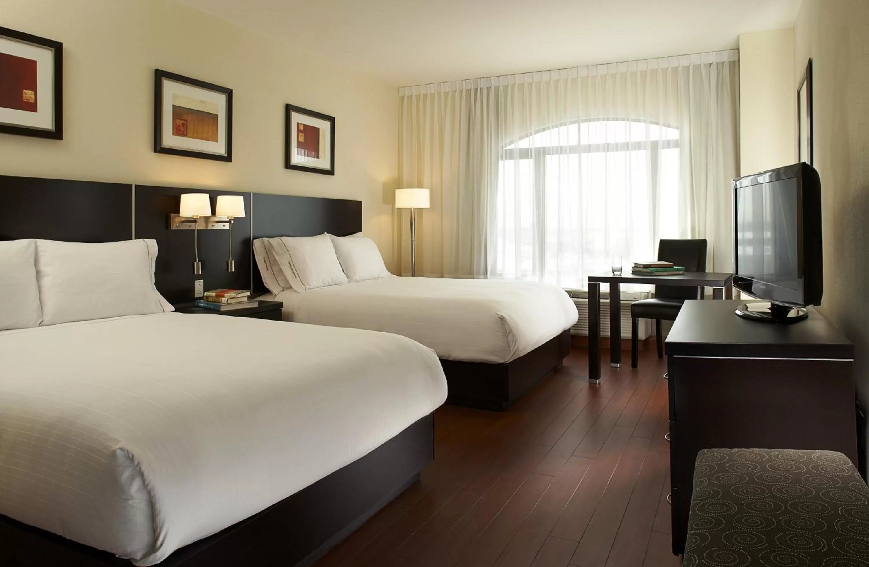 Photo of the whole room, Bed in Holiday Inn & Suites Montreal Airport by IHG