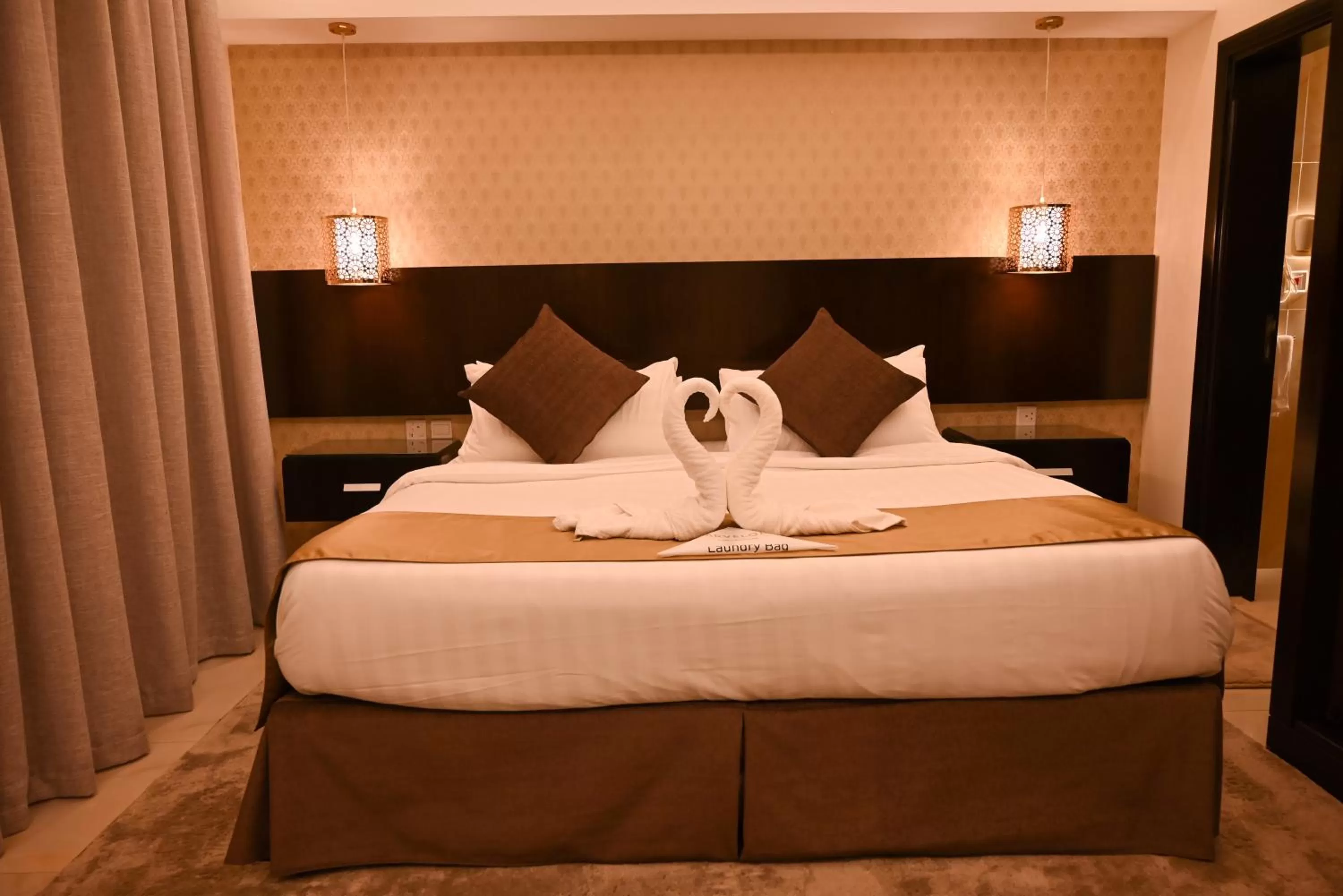 Bed in The Artisan Hotel-Suits