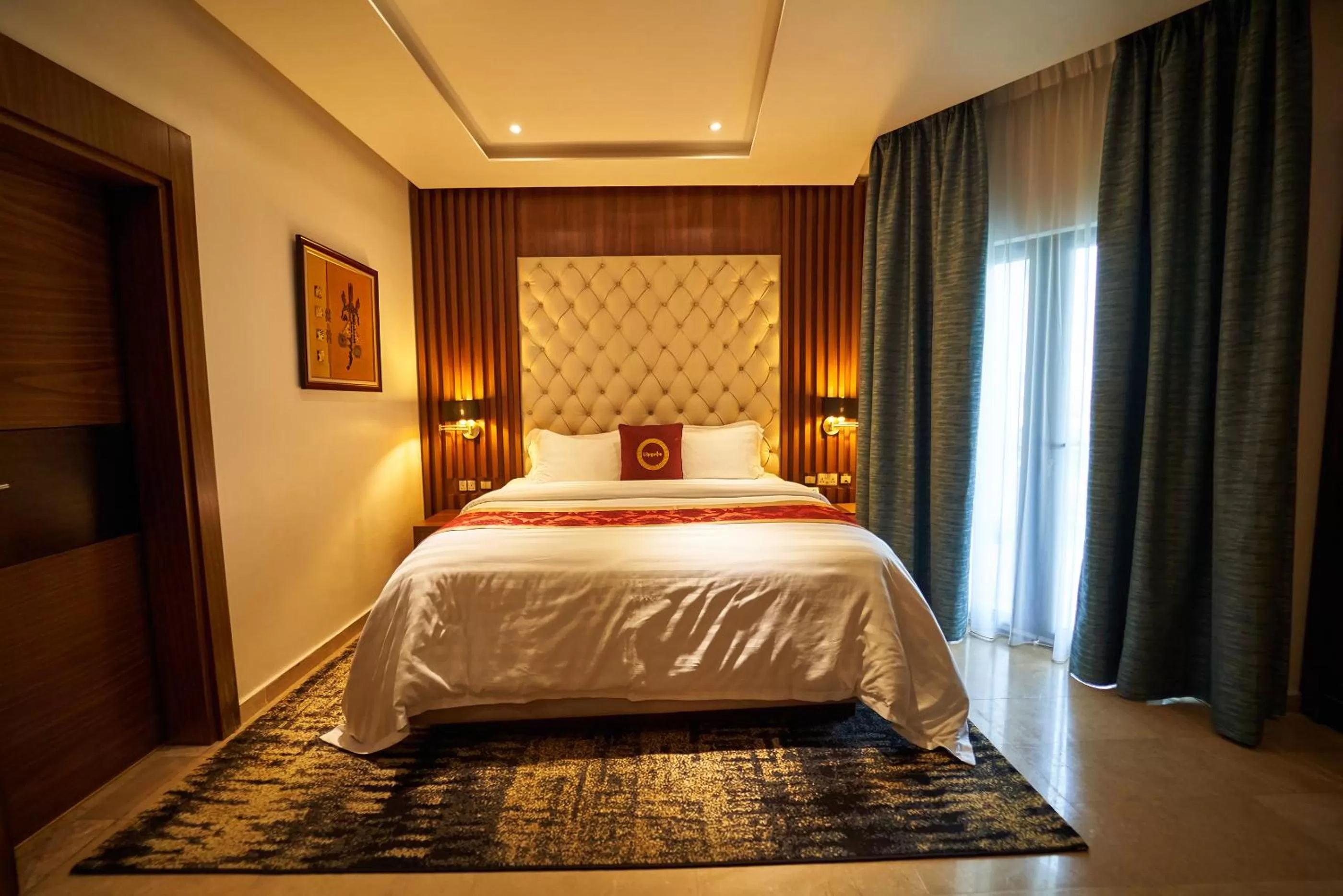 Photo of the whole room, Bed in The Lilygate Lagos