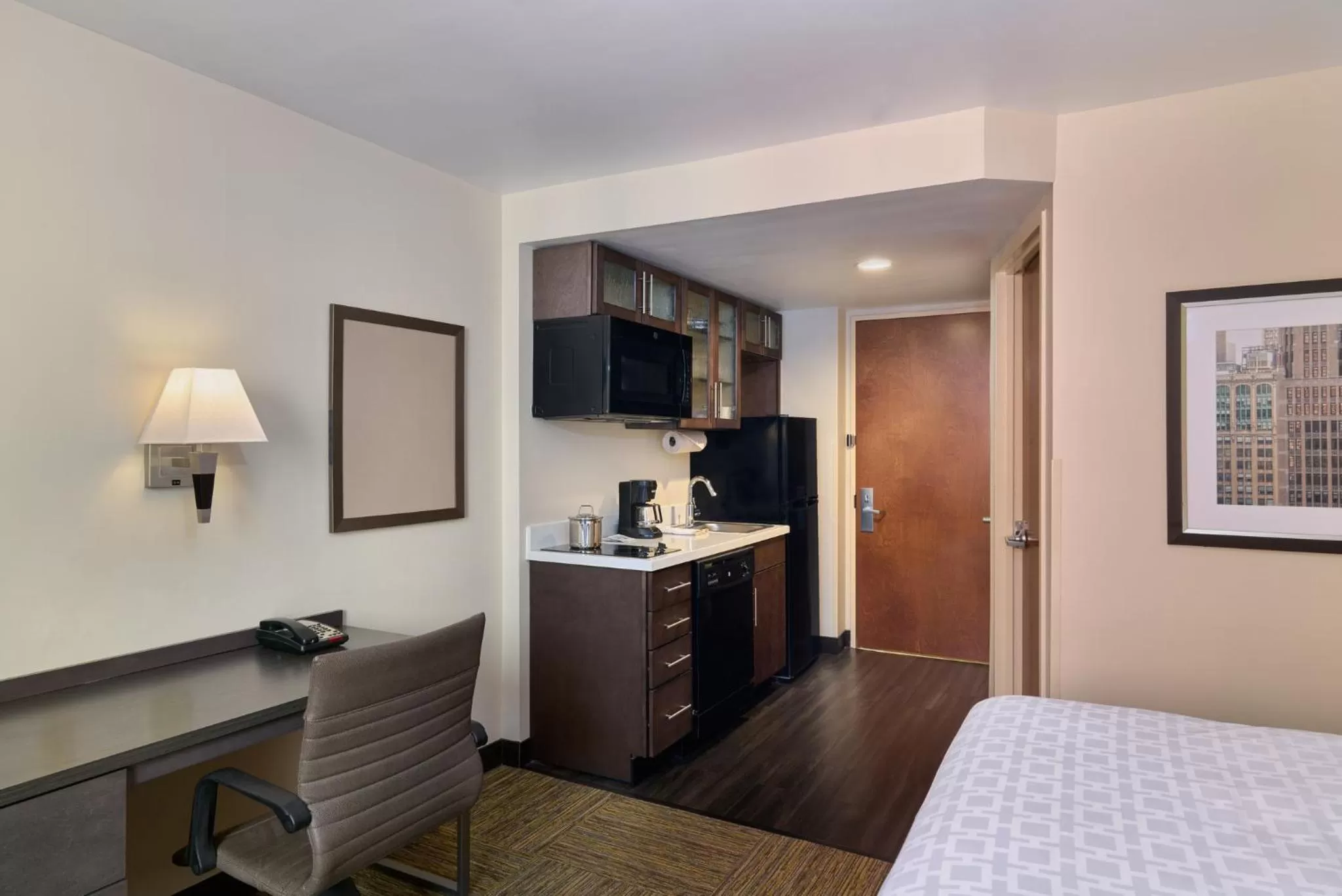 Photo of the whole room, Bed in Candlewood Suites NYC -Times Square by IHG