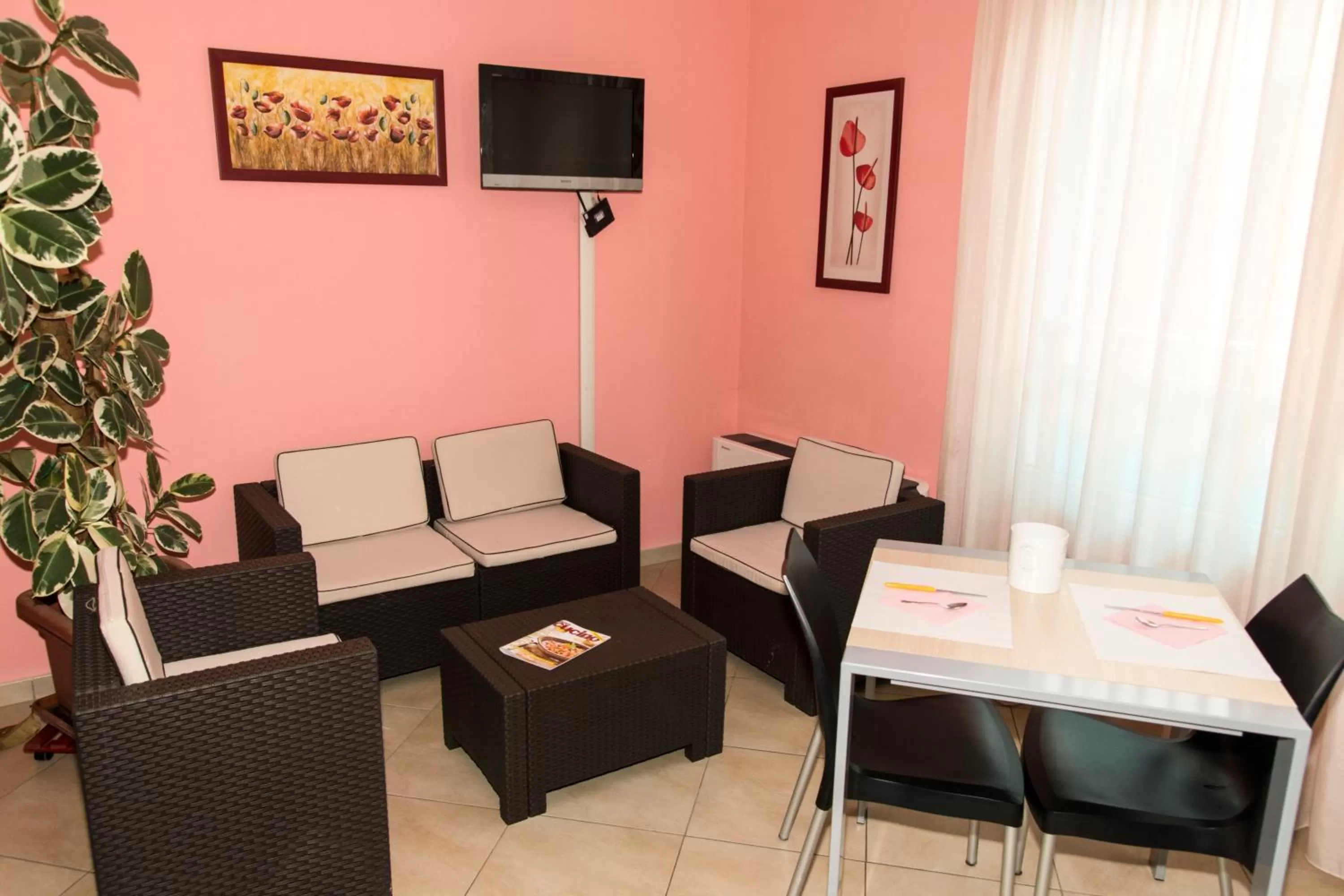 Communal lounge/ TV room in Hotel-Residence- Le Dune Breakfast & private beach included