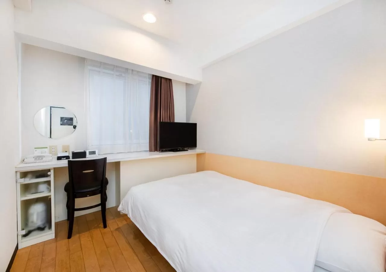 Bed in TKP Sunlife Hotel