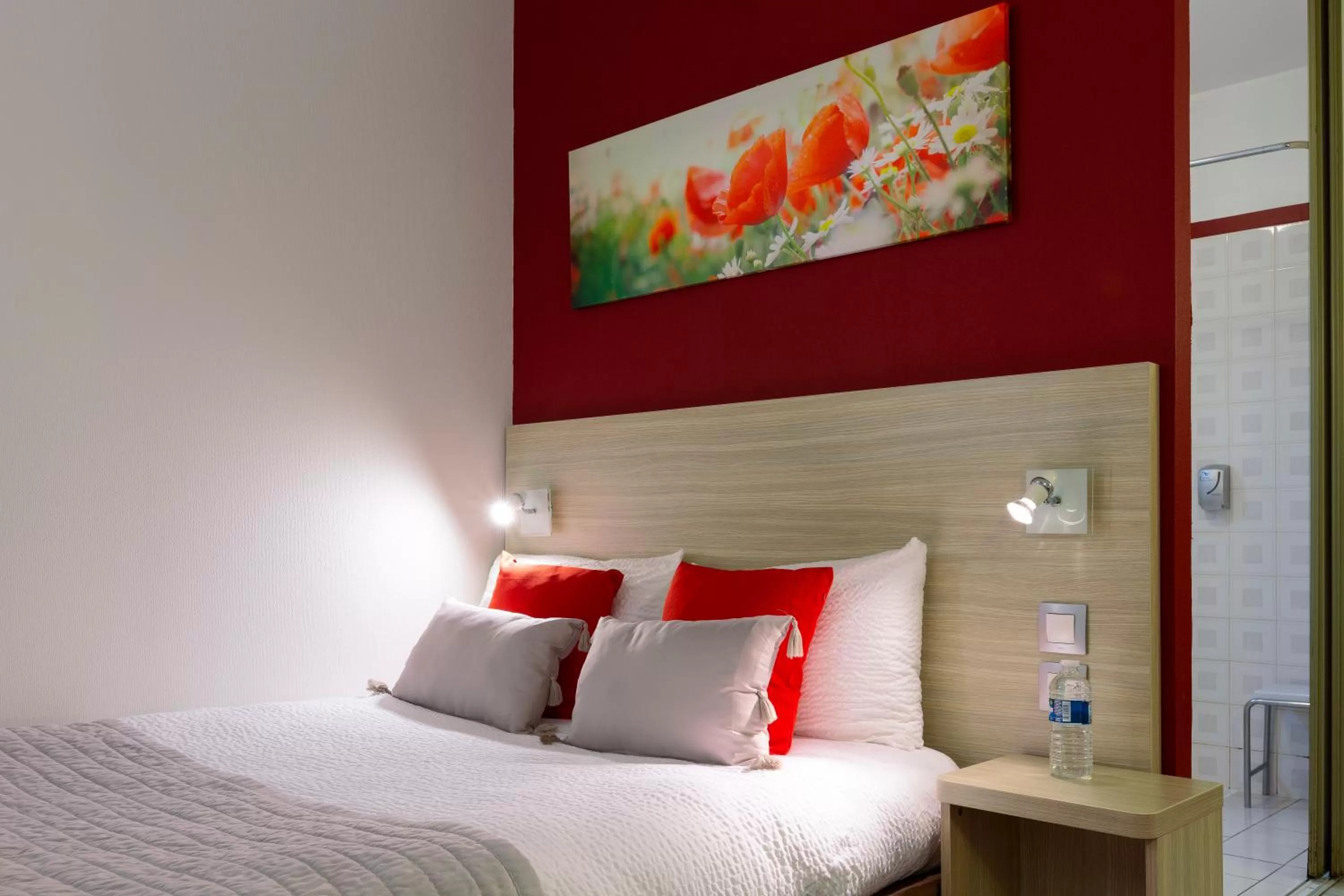 Bed in Logis Hotel Altina