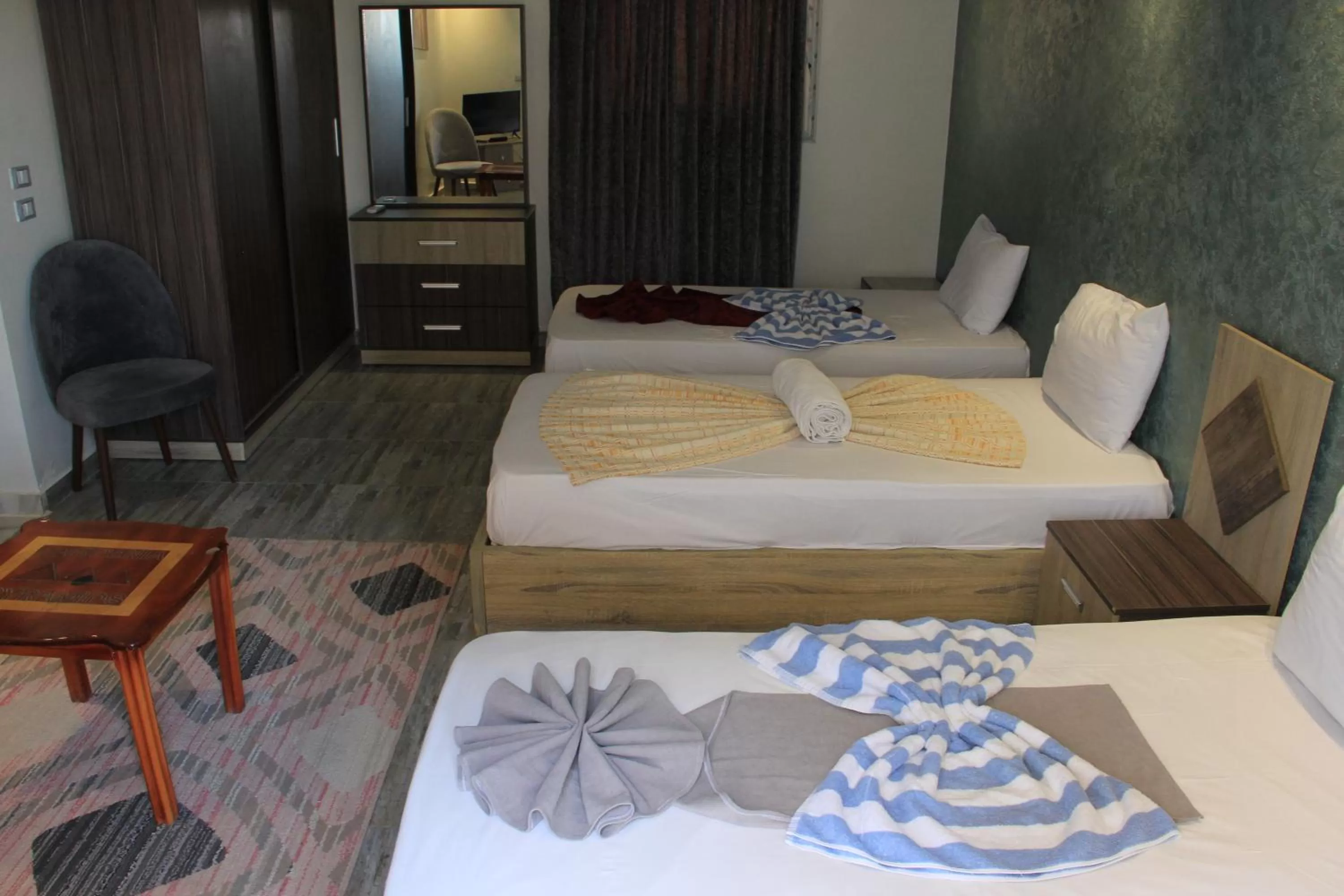 Photo of the whole room, Bed in Gardenia Inn Hotel