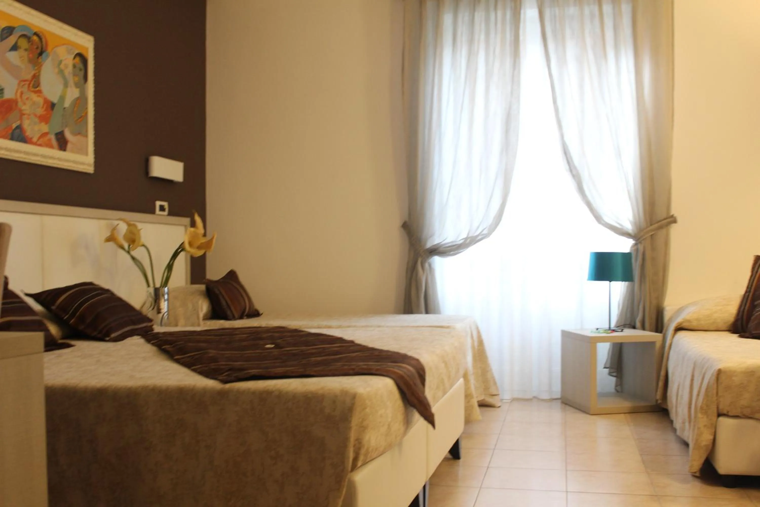 Bed in Artemisia Palace Hotel