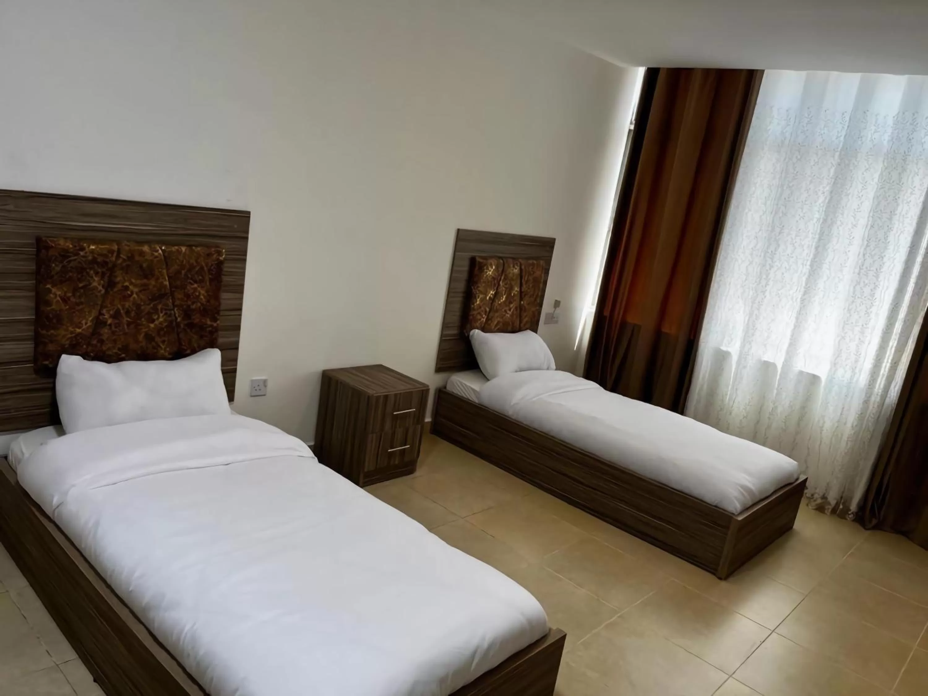 Photo of the whole room, Bed in Rayan Hotel Suites