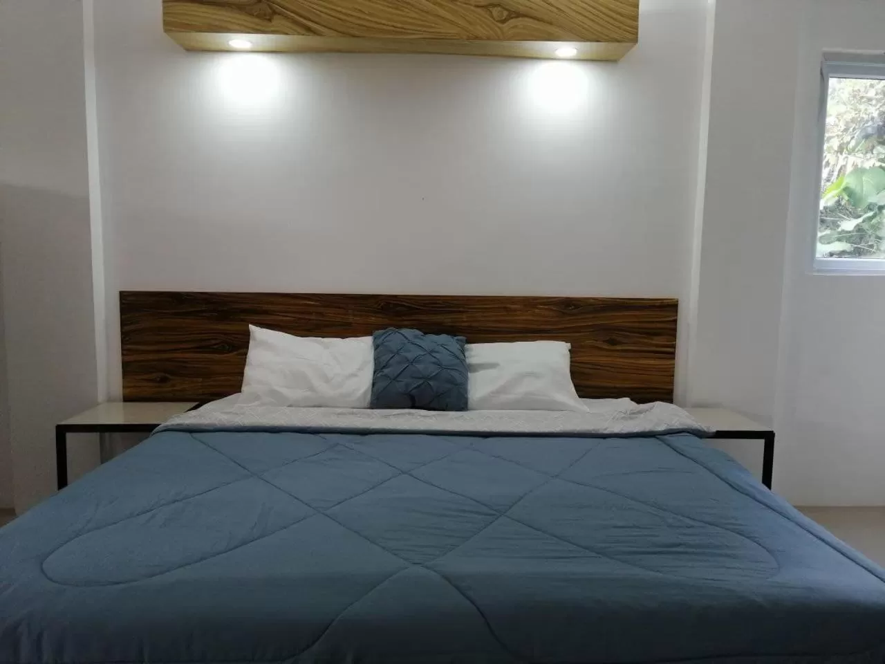 Bed in Purple Orchid Bed and Breakfast