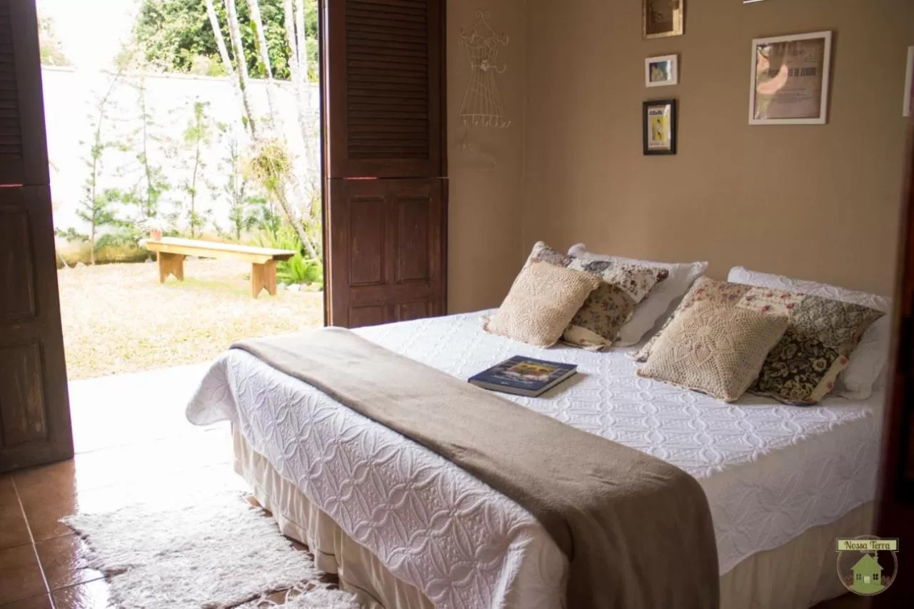 Bed in Pousada Nossa Terra