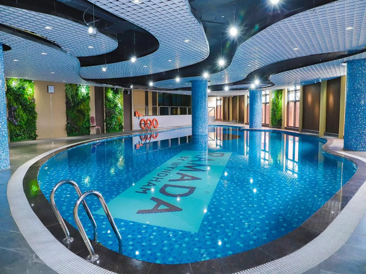Swimming pool in Ramada Hotel & Suites by Wyndham Halong Bay View