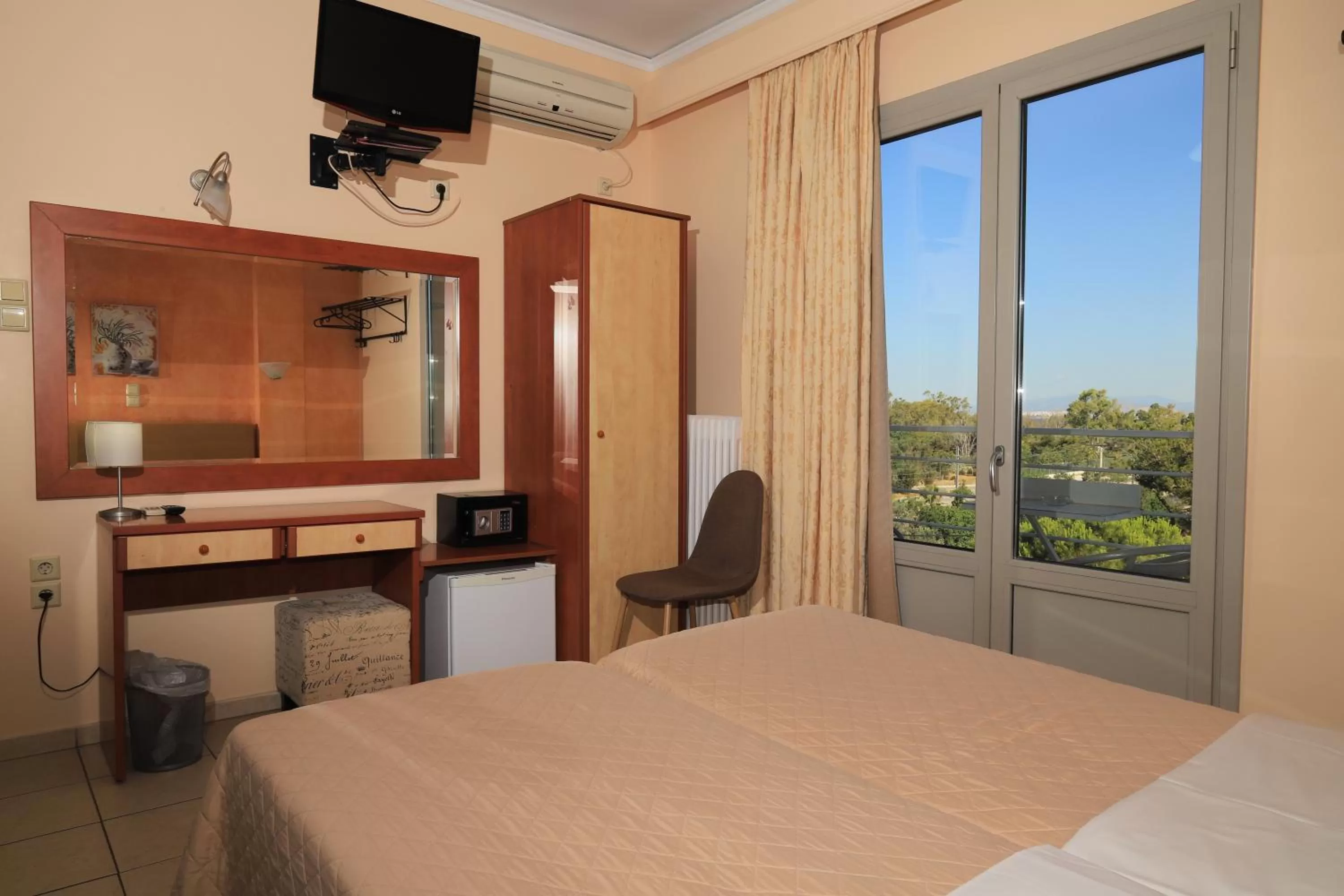 Bed in IKAROS Hotel ELLINIKO