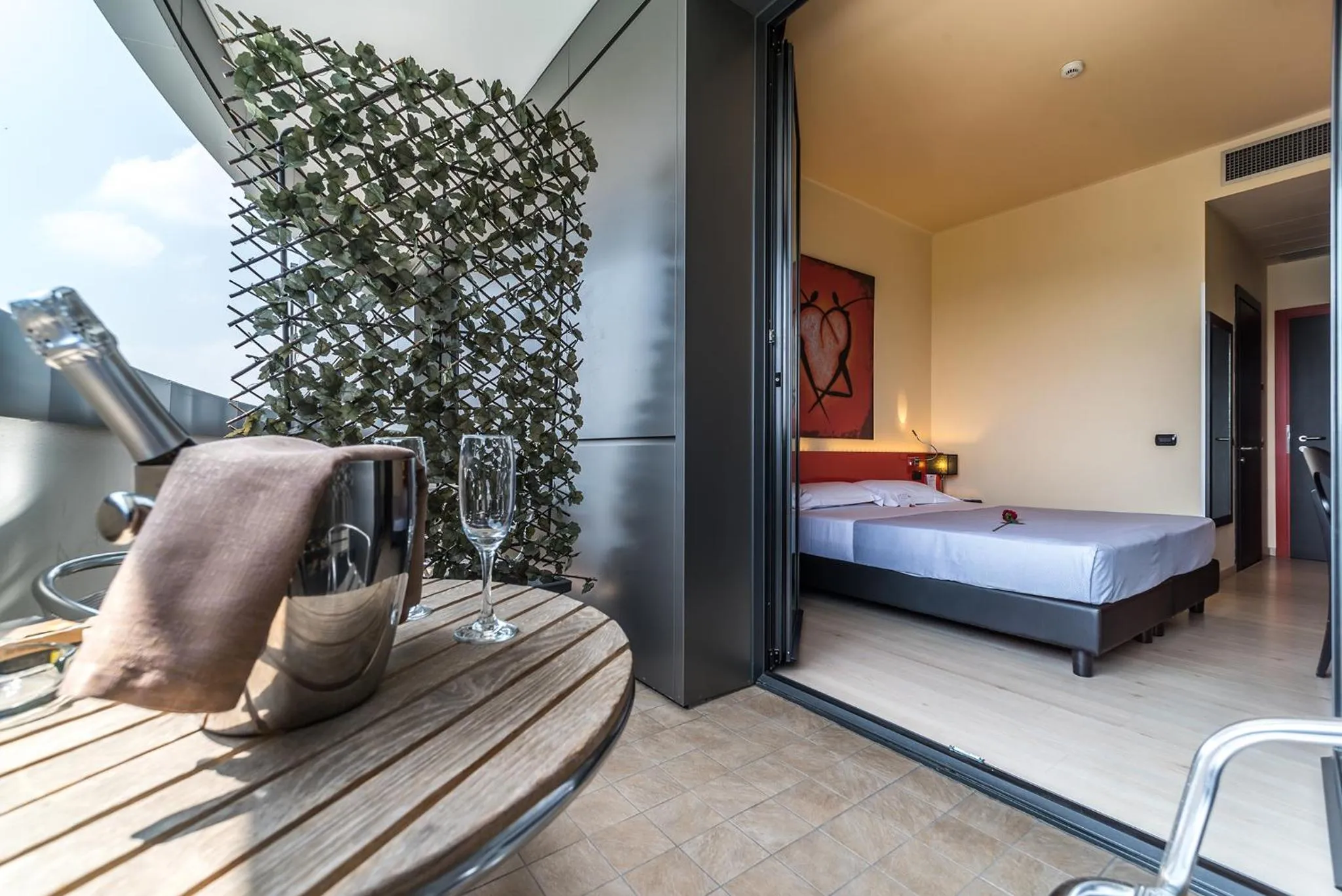 Balcony/Terrace, Bed in Amatì Design Green Hotel