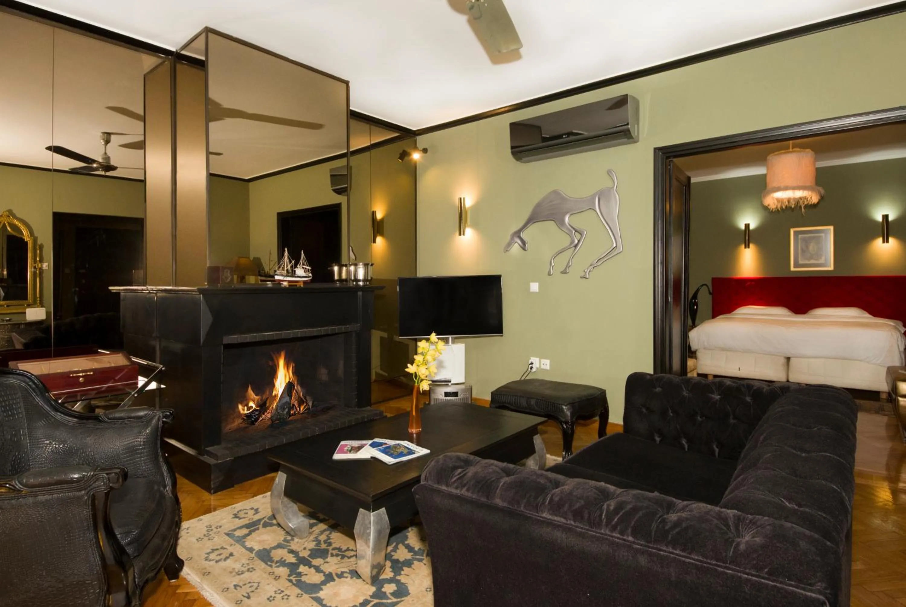 Living room, Bed in Andromeda Suites